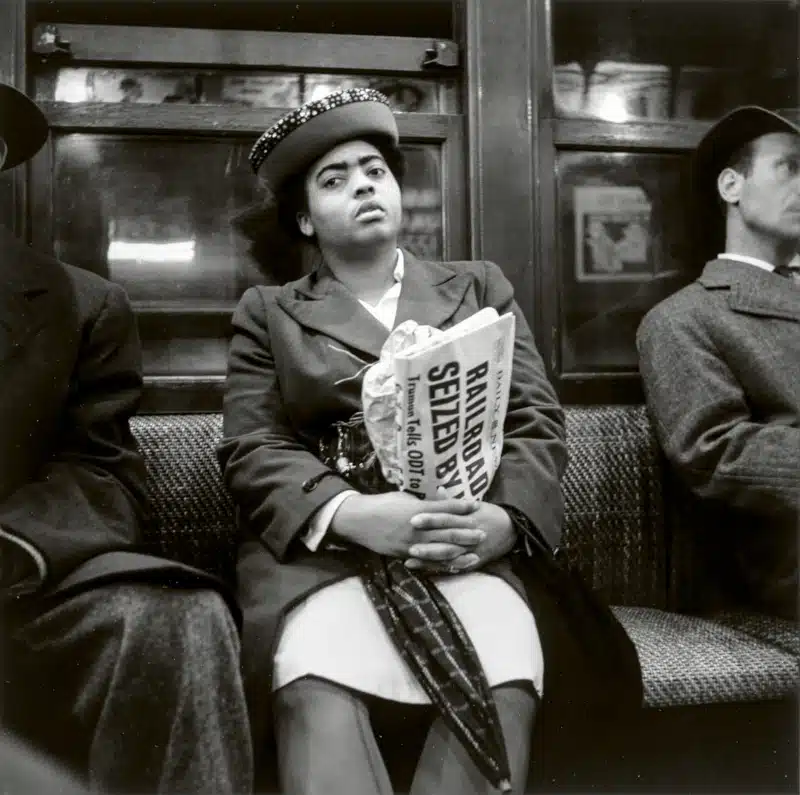 Woman Holding Newspaper, New York, 1946 © Louis Stettner Estate