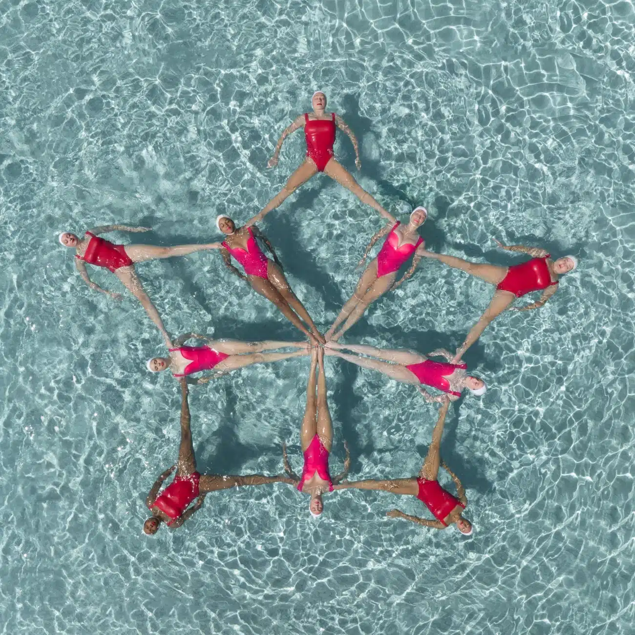 Aerial photography of artistic swimming by Brad Walls