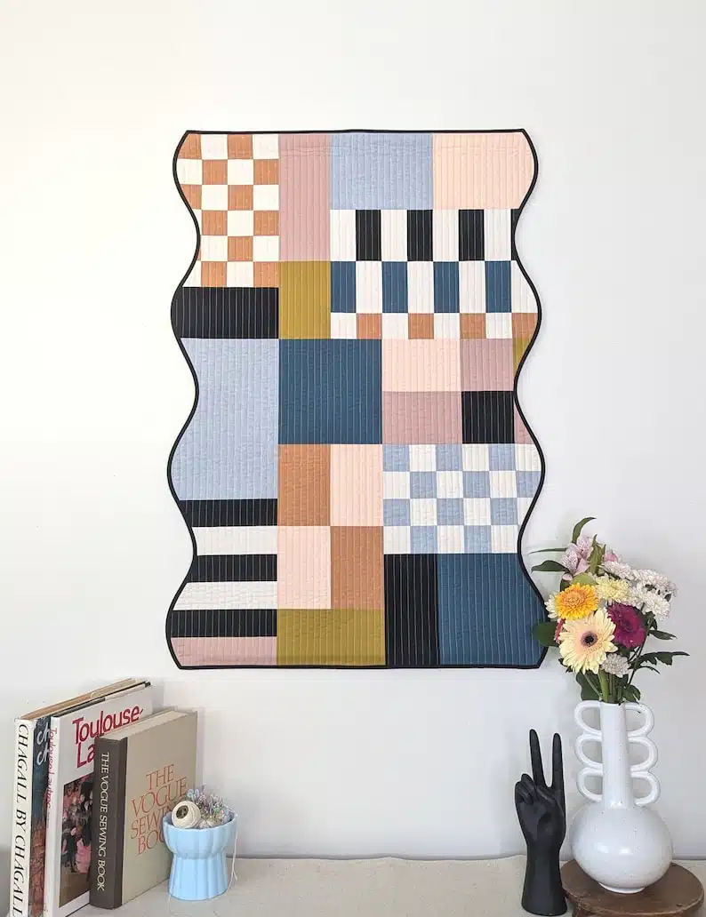 Modern patchwork quilt wall hanging by Mood and Mantle