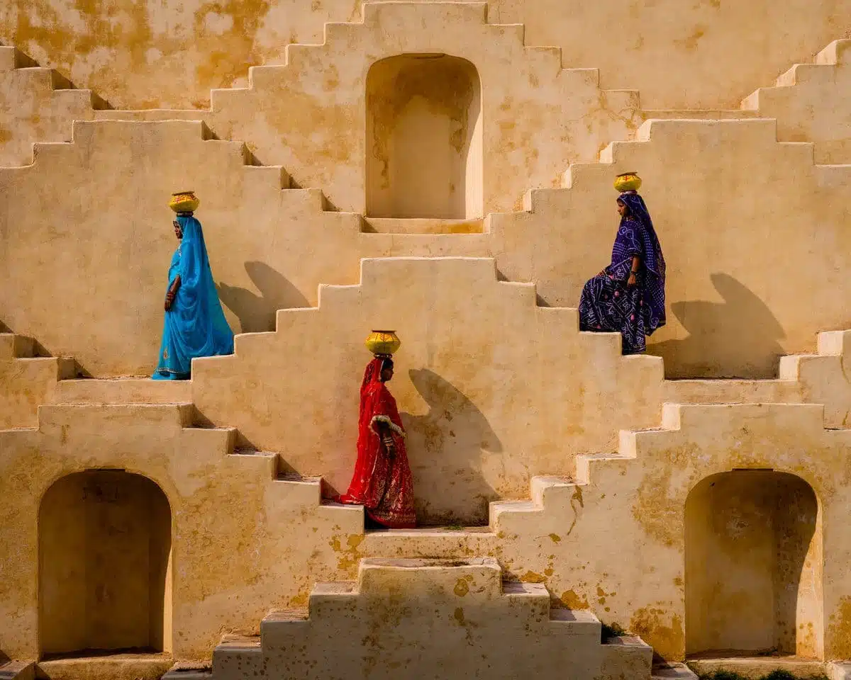 Women walking on stepwells in India