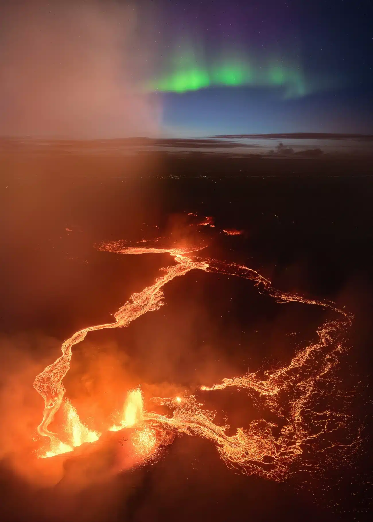 Aurora in Iceland with lava flowing