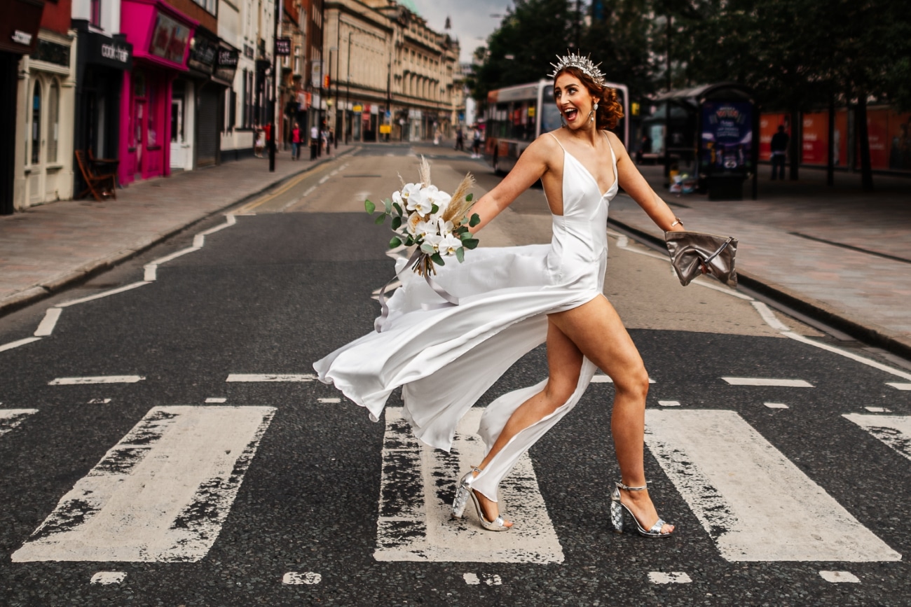 Bride crossing the street