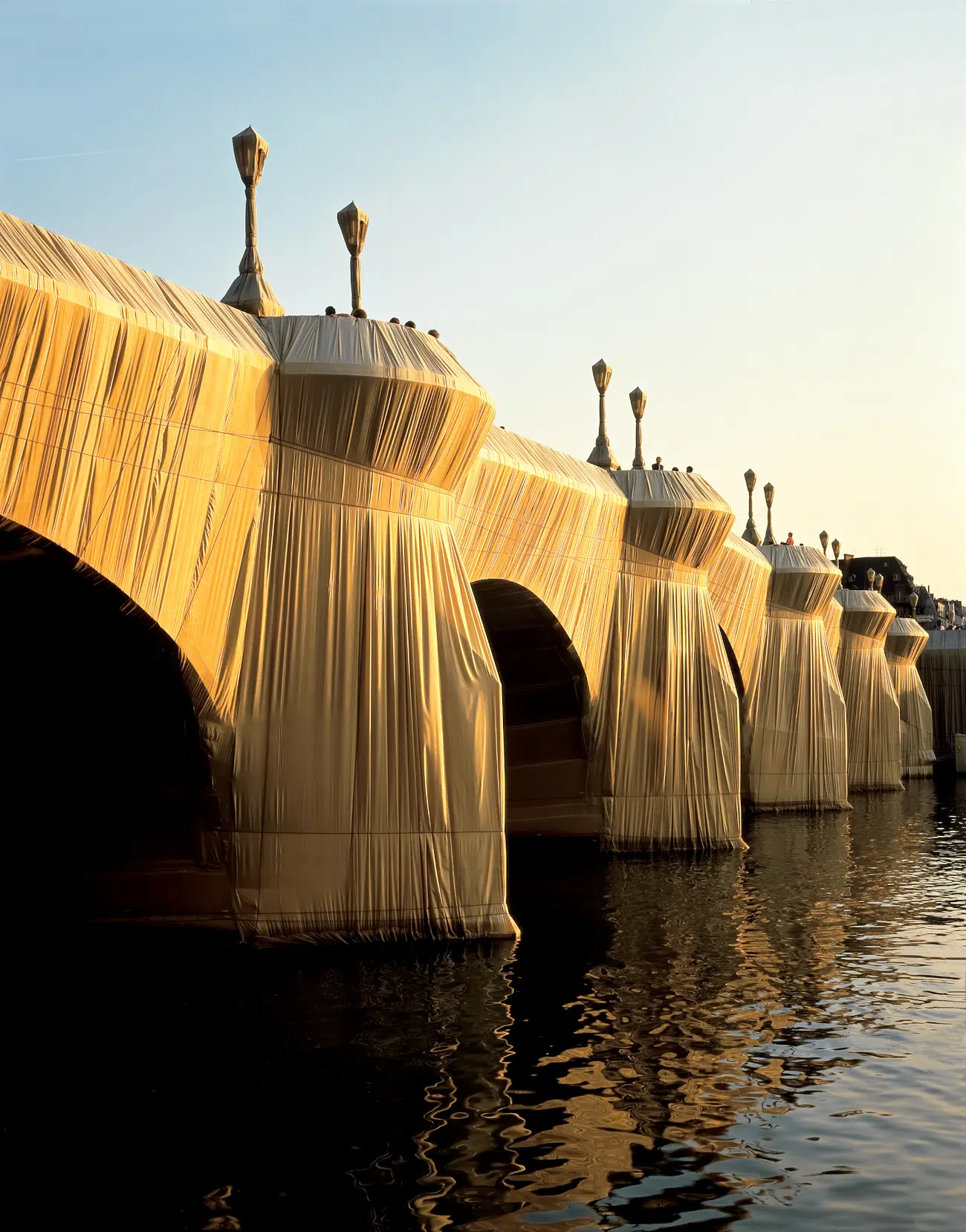 Christo and Jeanne-Claude. "The Pont Neuf Wrapped," Paris, 1975-85. (Photo: Wolfgang Volz © 1985 Christo and Jeanne-Claude Foundation)