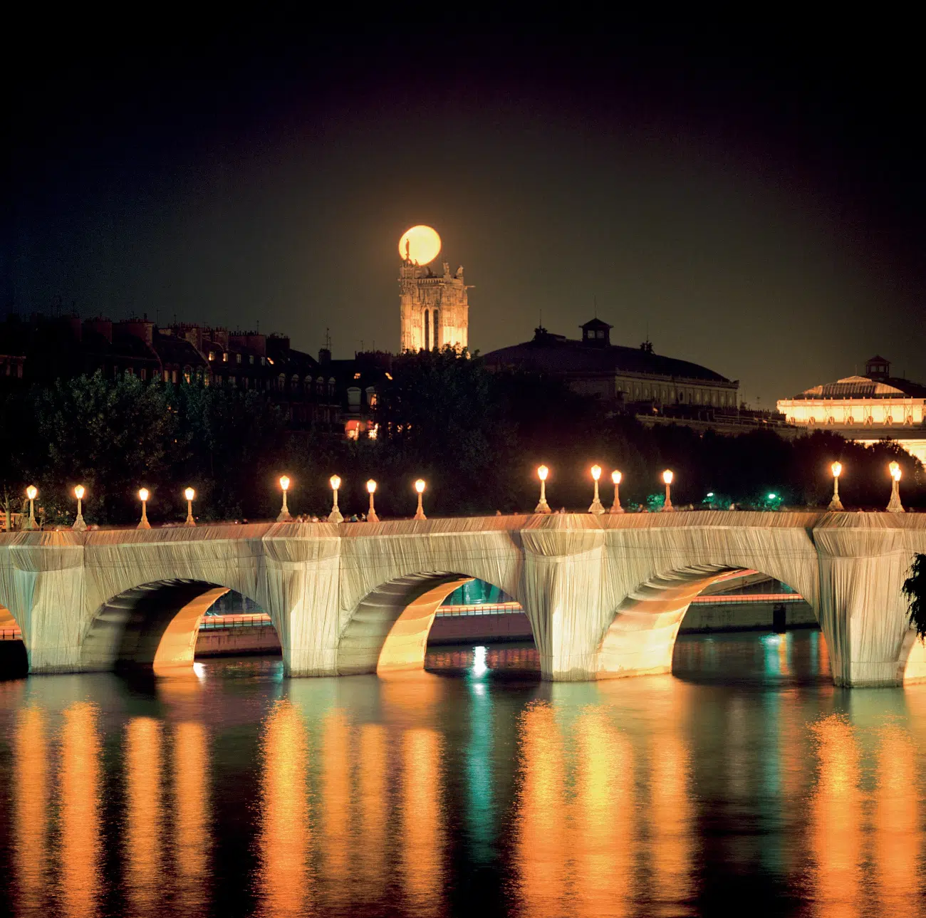 Christo and Jeanne-Claude. "The Pont Neuf Wrapped," Paris, 1975-85. (Photo: Wolfgang Volz © 1985 Christo and Jeanne-Claude Foundation)