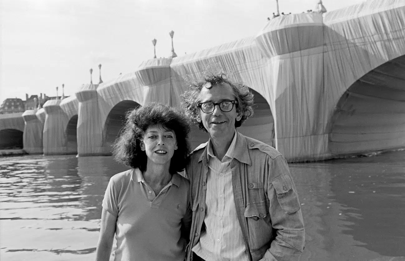 Christo and Jeanne-Claude at The Pont Neuf Wrapped. Paris, 1985 (Photo: Wolfgang Volz © 1985 Christo and Jeanne-Claude Foundation)