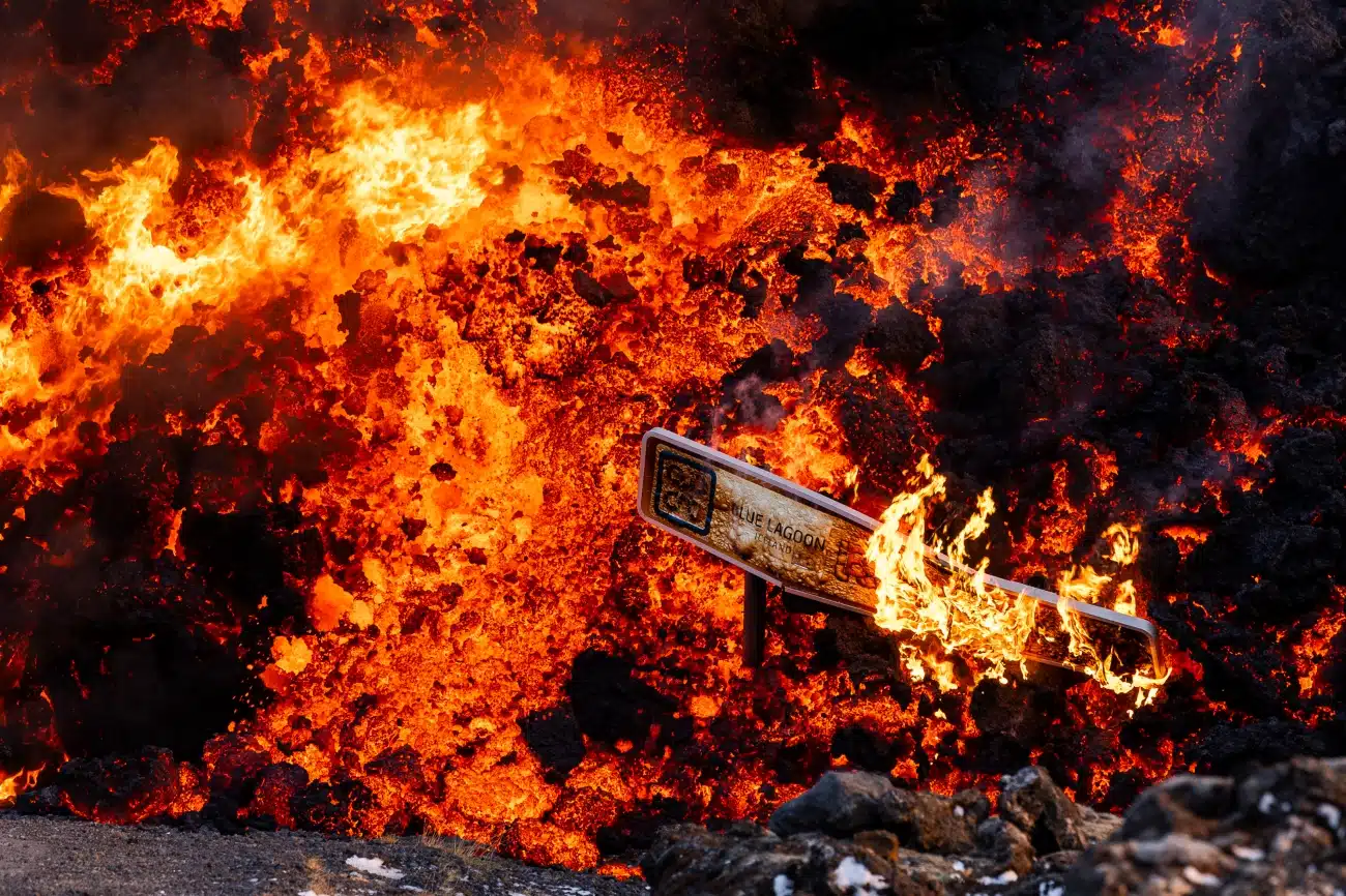 The Blue Lagoon road sign on fire