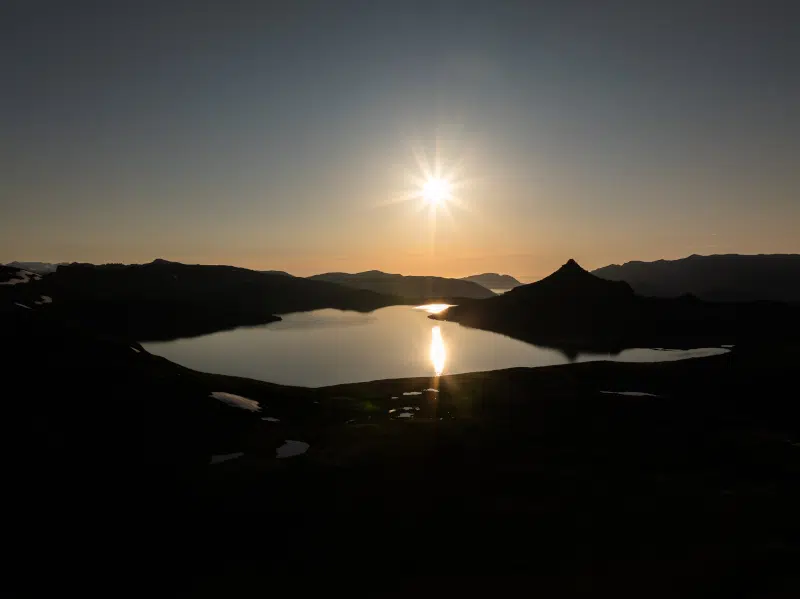 Midnight sun over landscape in Iceland