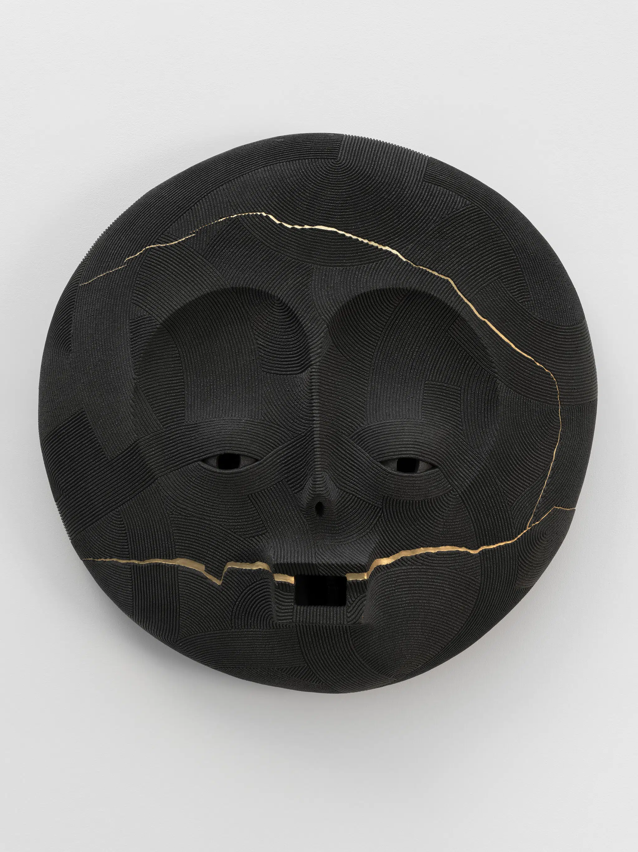 Playful ceramic sculpture created by En Iwamura for his solo exhibition, "Mask," at Ross+Kramer in January 2025