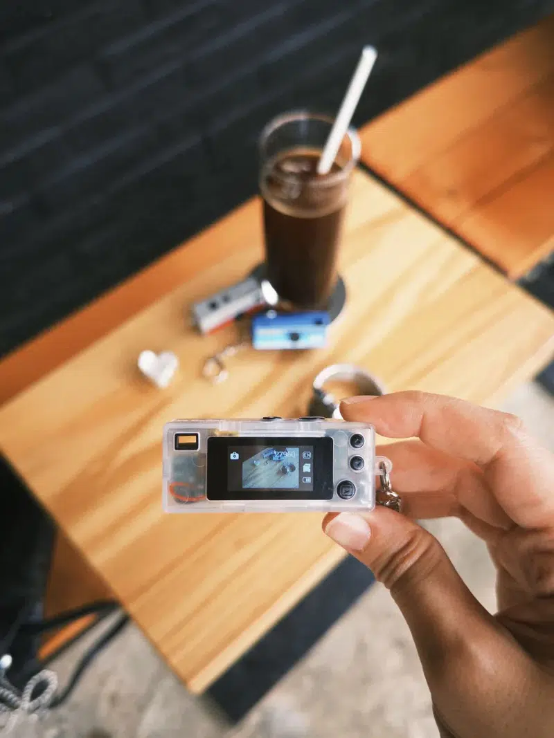 Person holding a Kodak Charmera