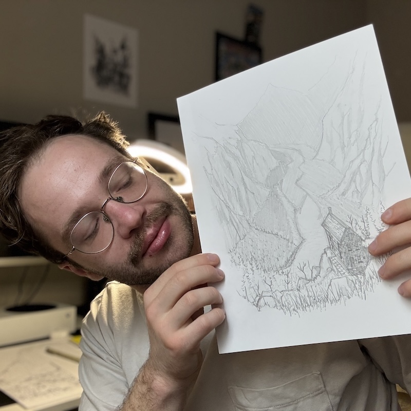 Sam Gillett Holding Finished Drawing