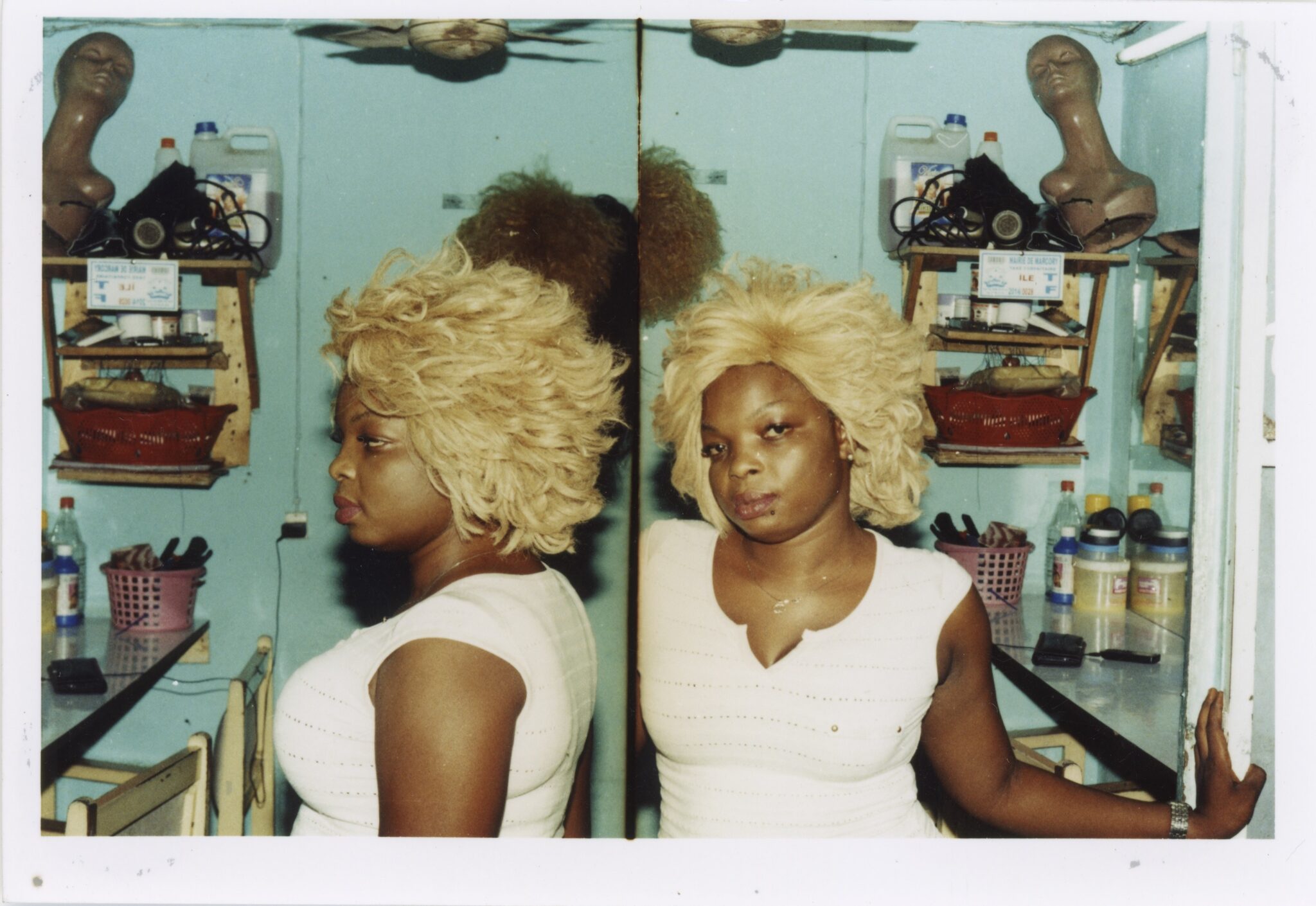 Emilie Regnier, 2014. During a visit to Abidjan, Ivory Coast, Regnier photographed women in beauty salons, letting them show of their hair.