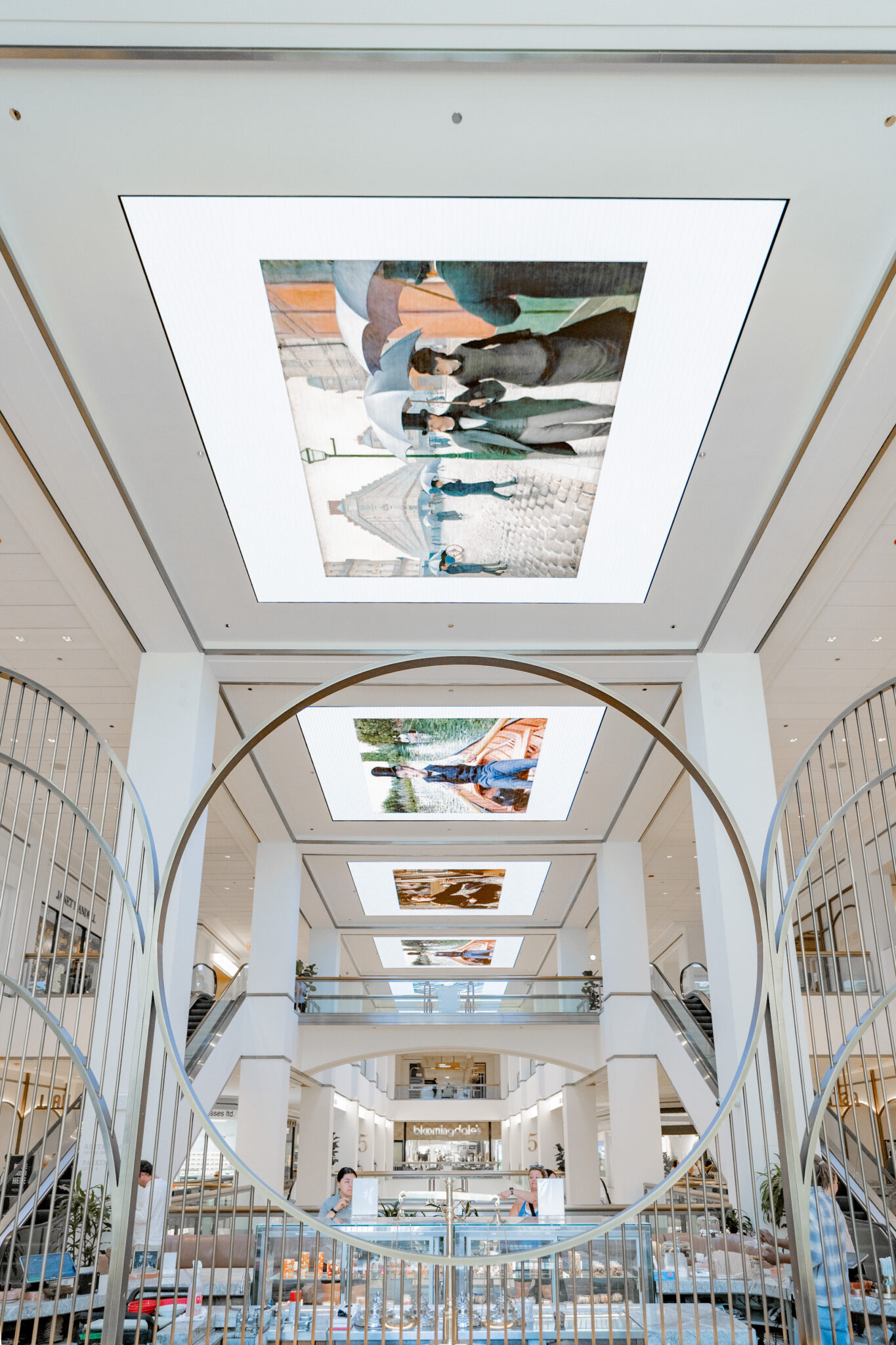 View of the immersive, digital installation at Chicago's Magnificent Mile created in collaboration with the Art Institute of Chicago and the Canopy, featuring six of Gustave Caillebotte's most famous paintings