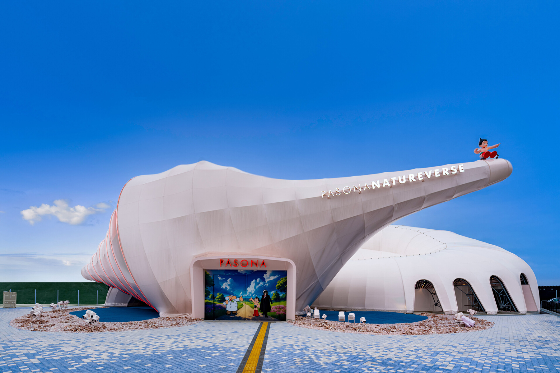 Pasona Natureverse Pavilion at the 2025 Osaka World Expo. The structure resembles a monumental seashell.