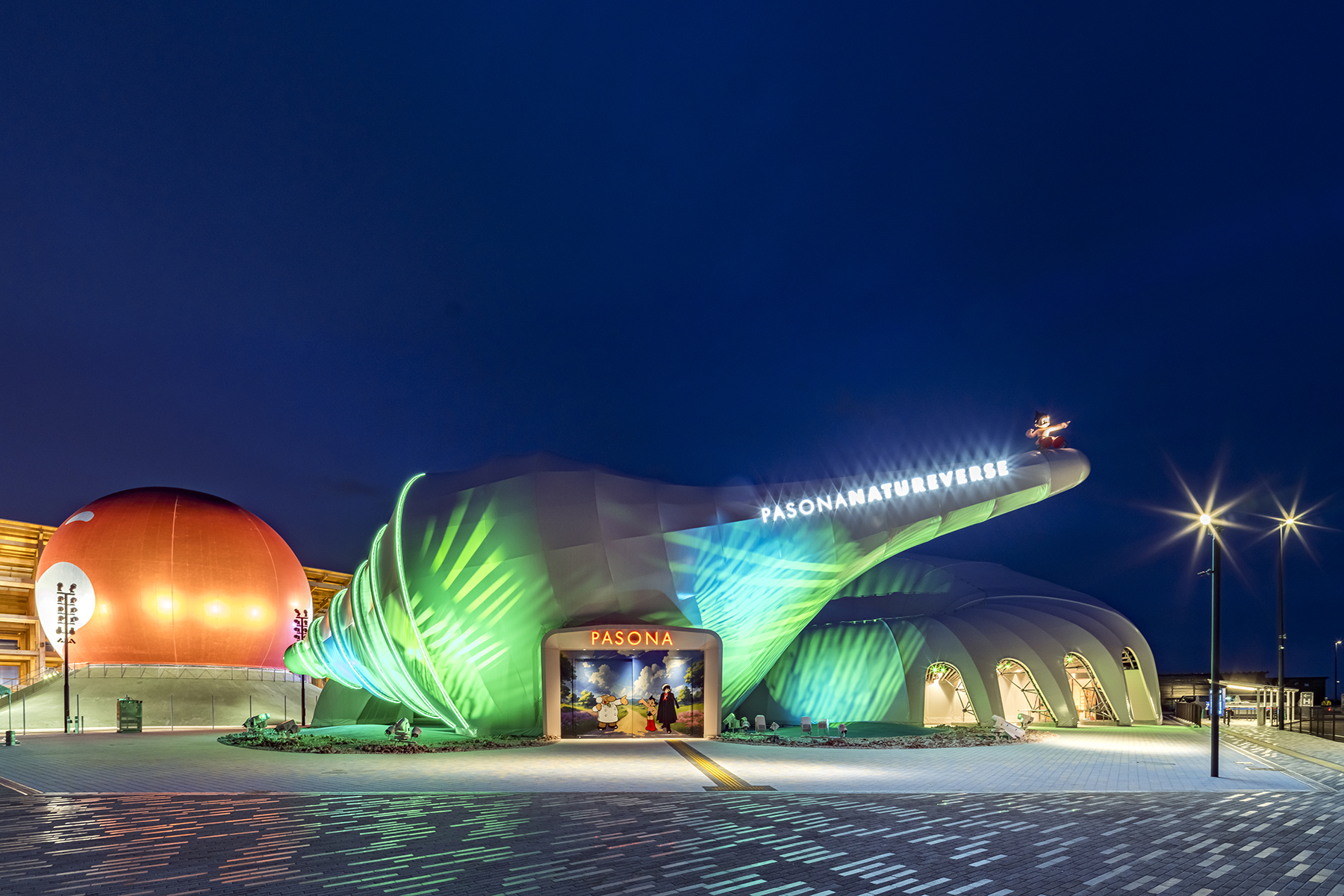 Pasona Natureverse Pavilion at the 2025 Osaka World Expo. The structure resembles a monumental seashell.