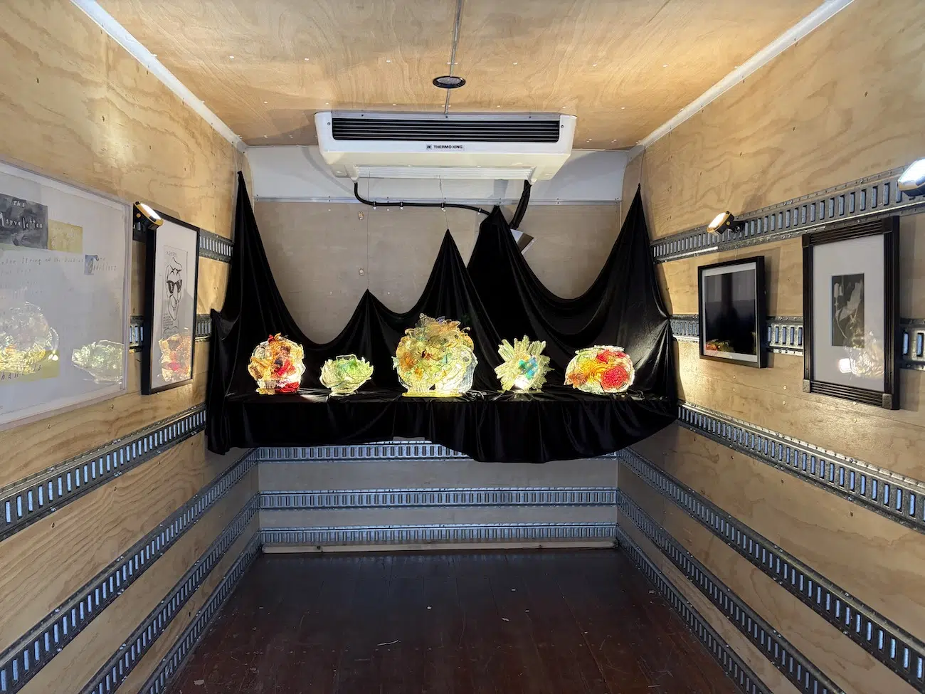 Glass works by Resurrect Studio, staged inside Atelier4’s truck lounge.