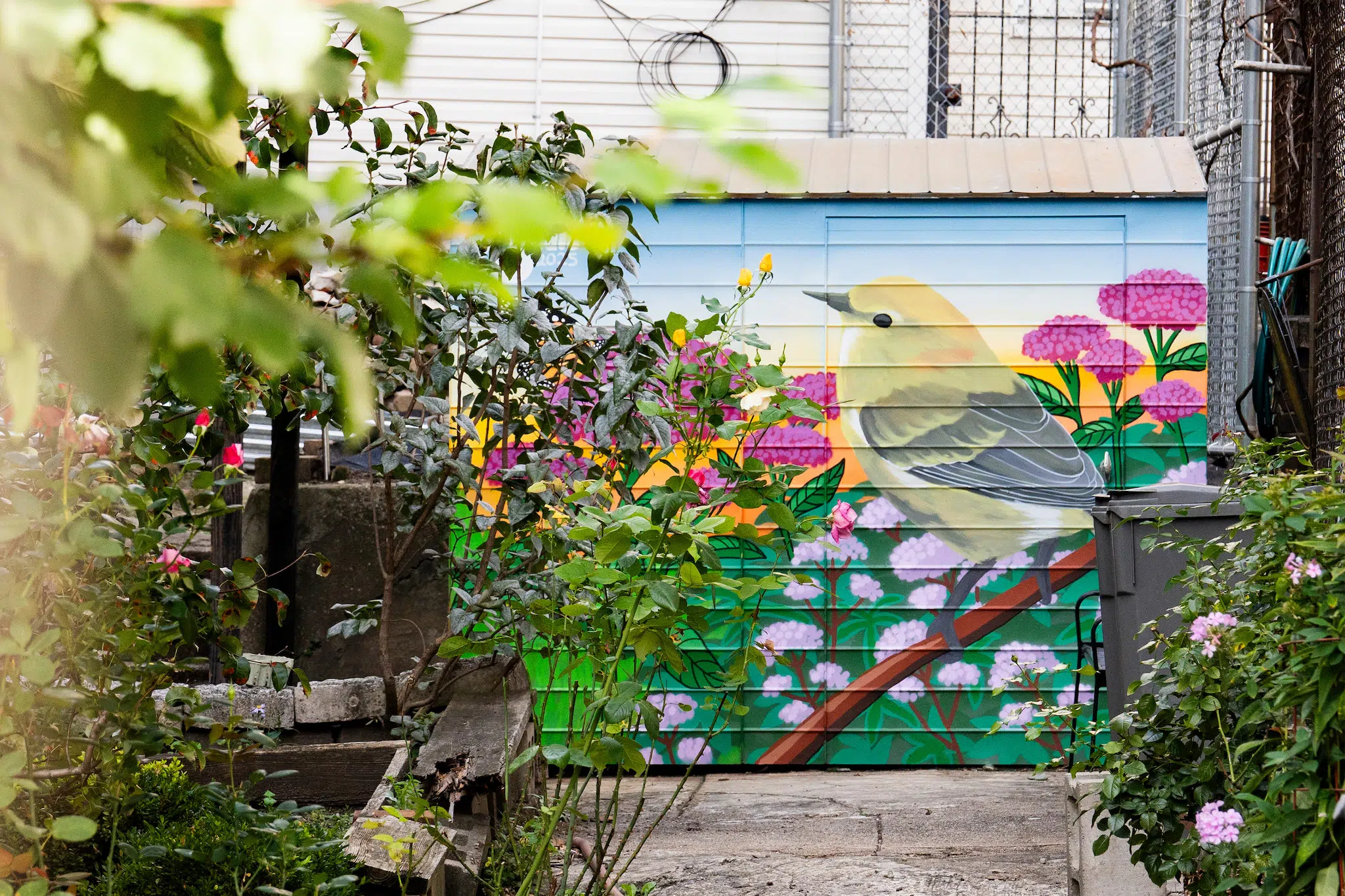 Mural by Talisa Almonte at Dolorinda Lisante Community Garden in the Bronx. (Photo: Sydney Walsh)