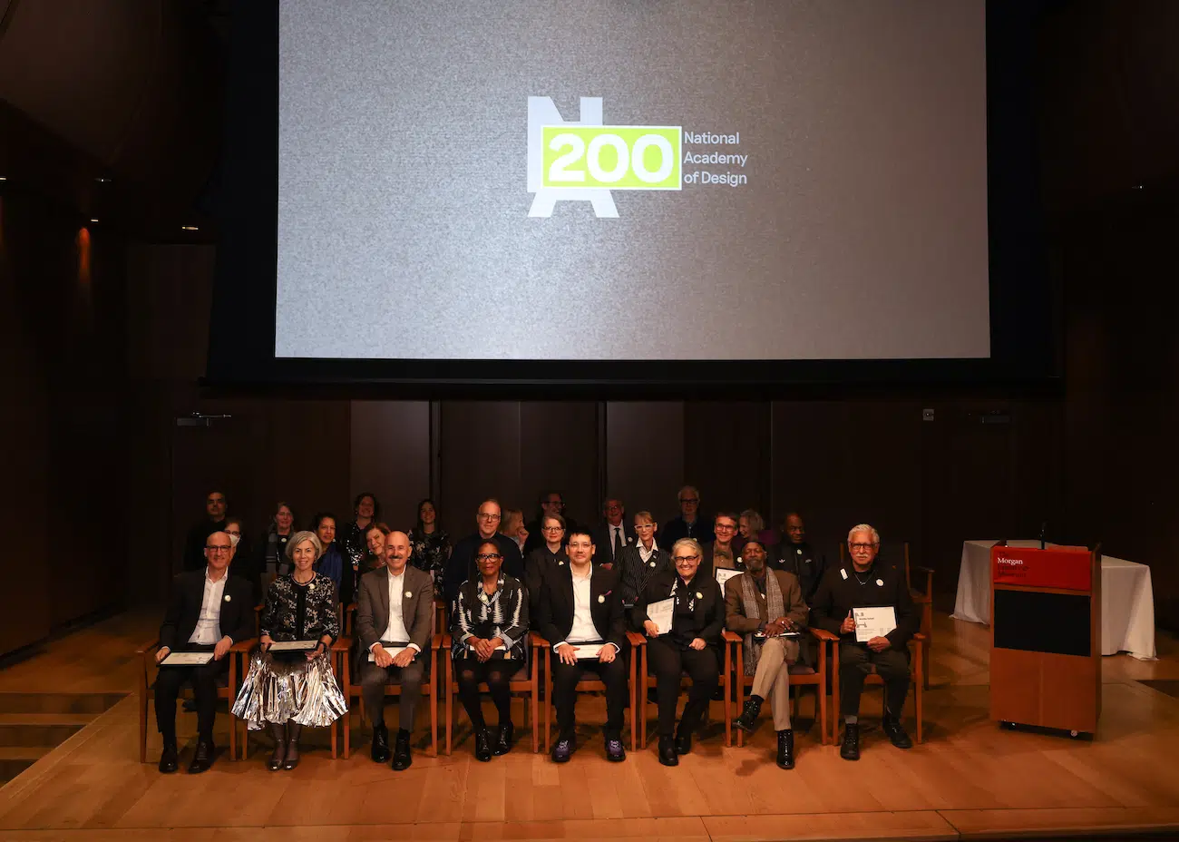 The 2025 class of Academicians during the National Academy of Design’s induction ceremony, held on November 8 at the Morgan Library in New York, NY. (Photo: BFA)