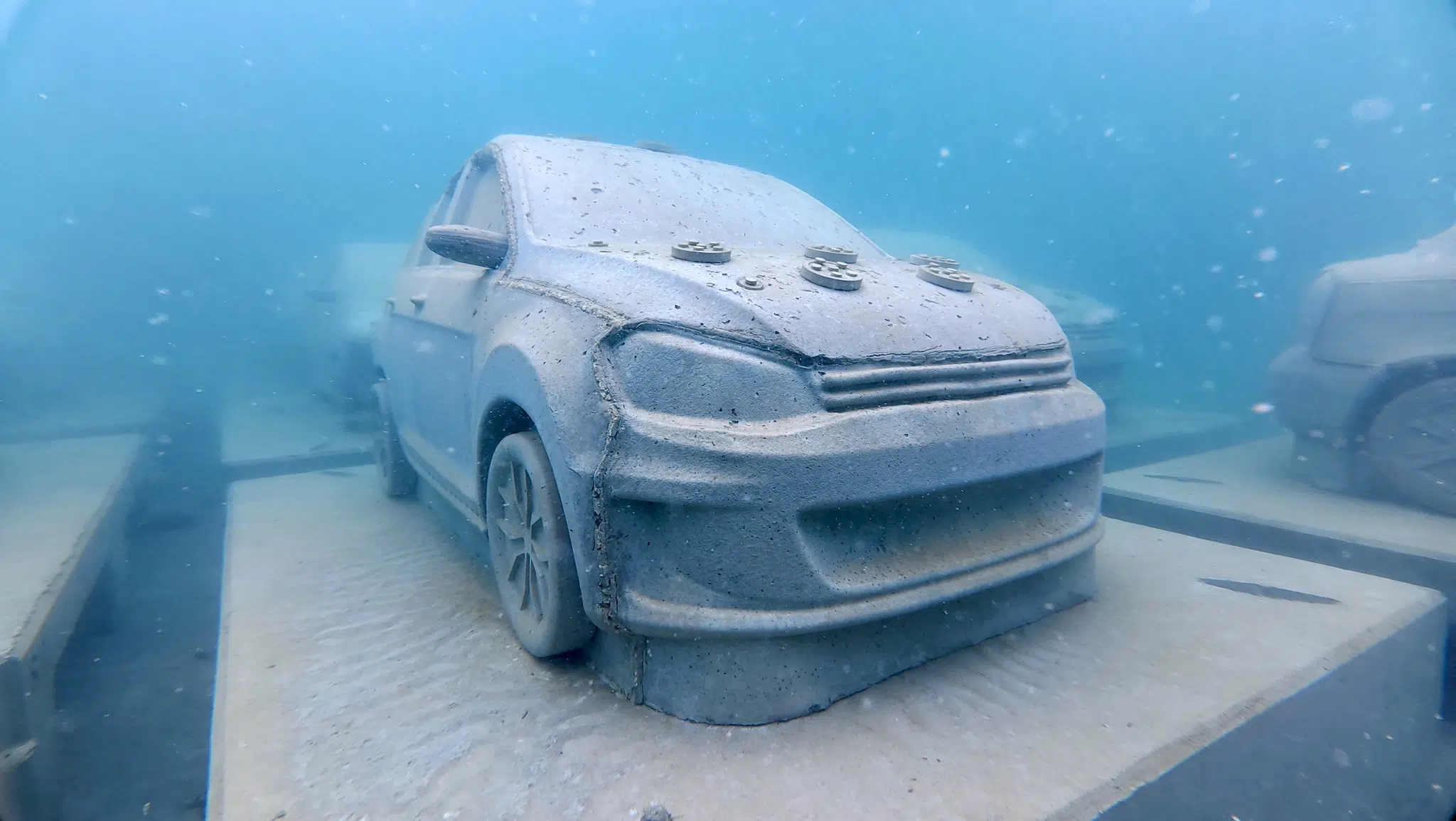 &ldquo;Concrete Coral,&rdquo; 2025, subaquatic installation featuring 22 concrete cars