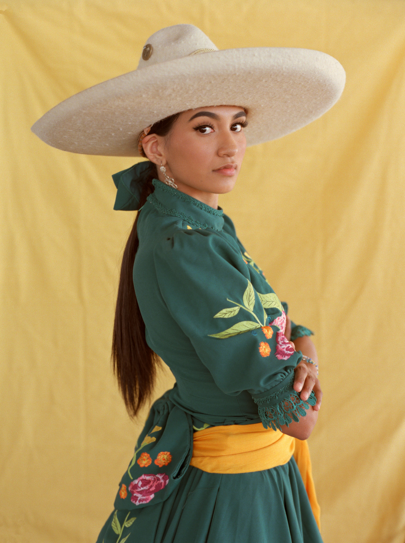 Mexican female horse rider in traditional attire for Escaramuza