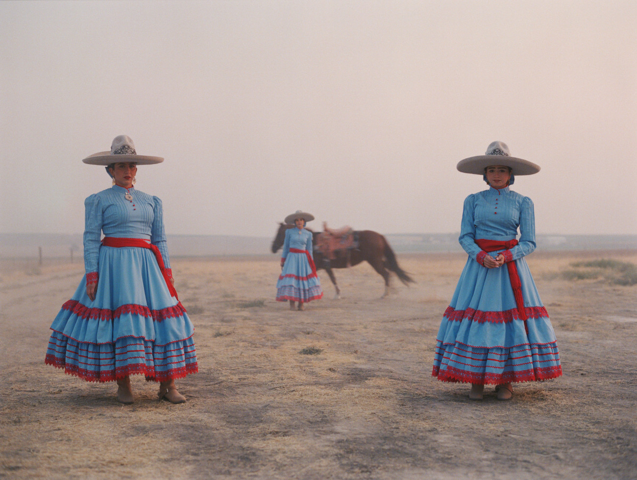 Mexican female horse riders in traditional attire for Escaramuza