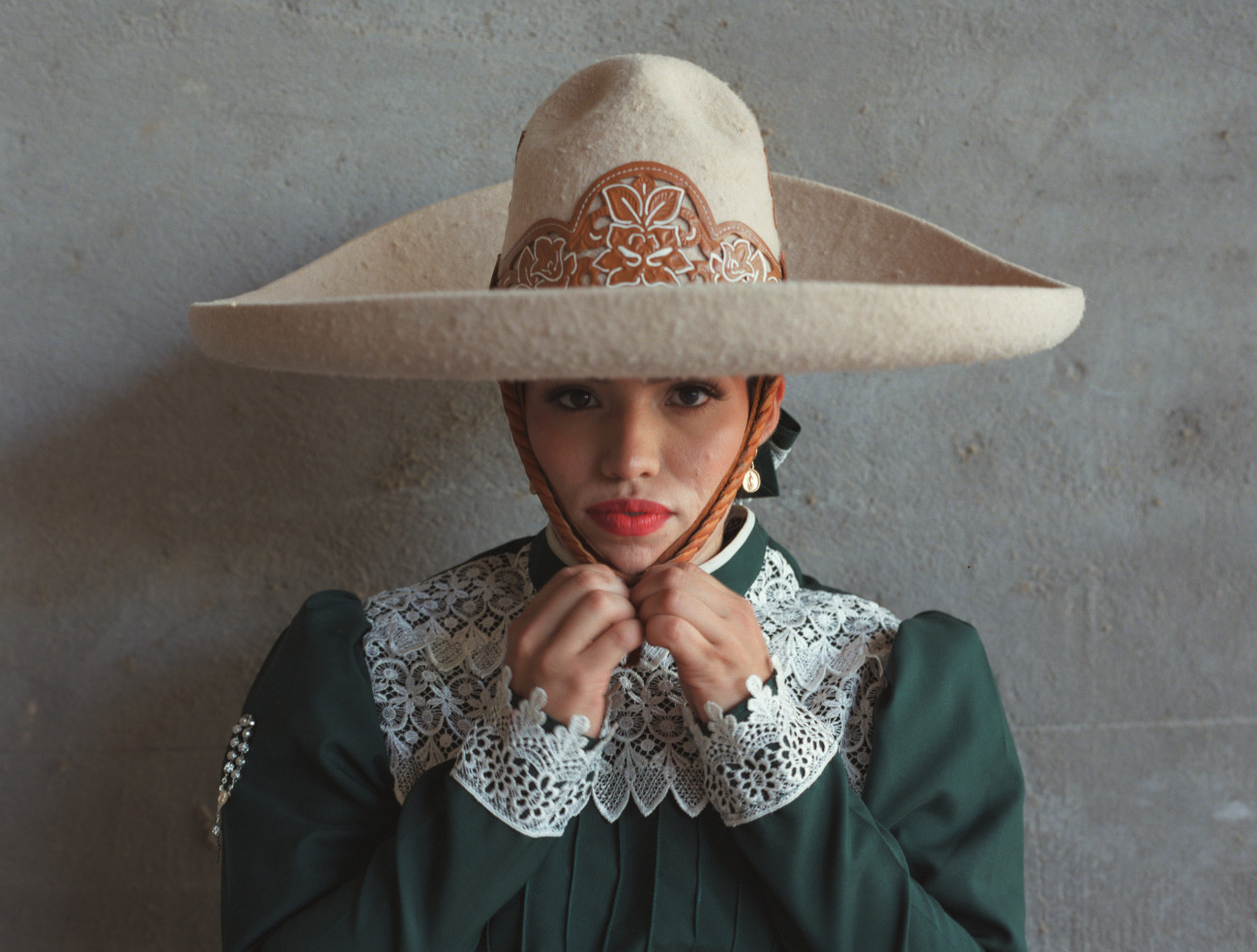 Mexican female horse rider in traditional attire for Escaramuza