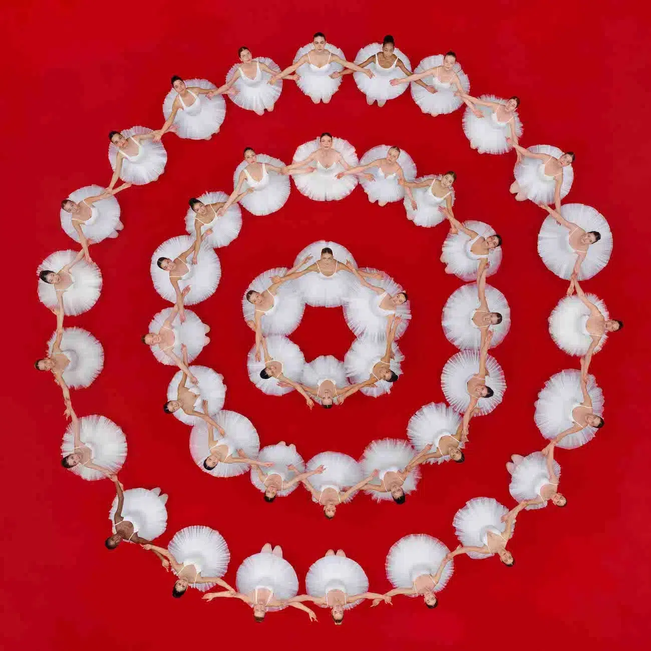 Flat overhead view of ballet dancers in symmetrical formation