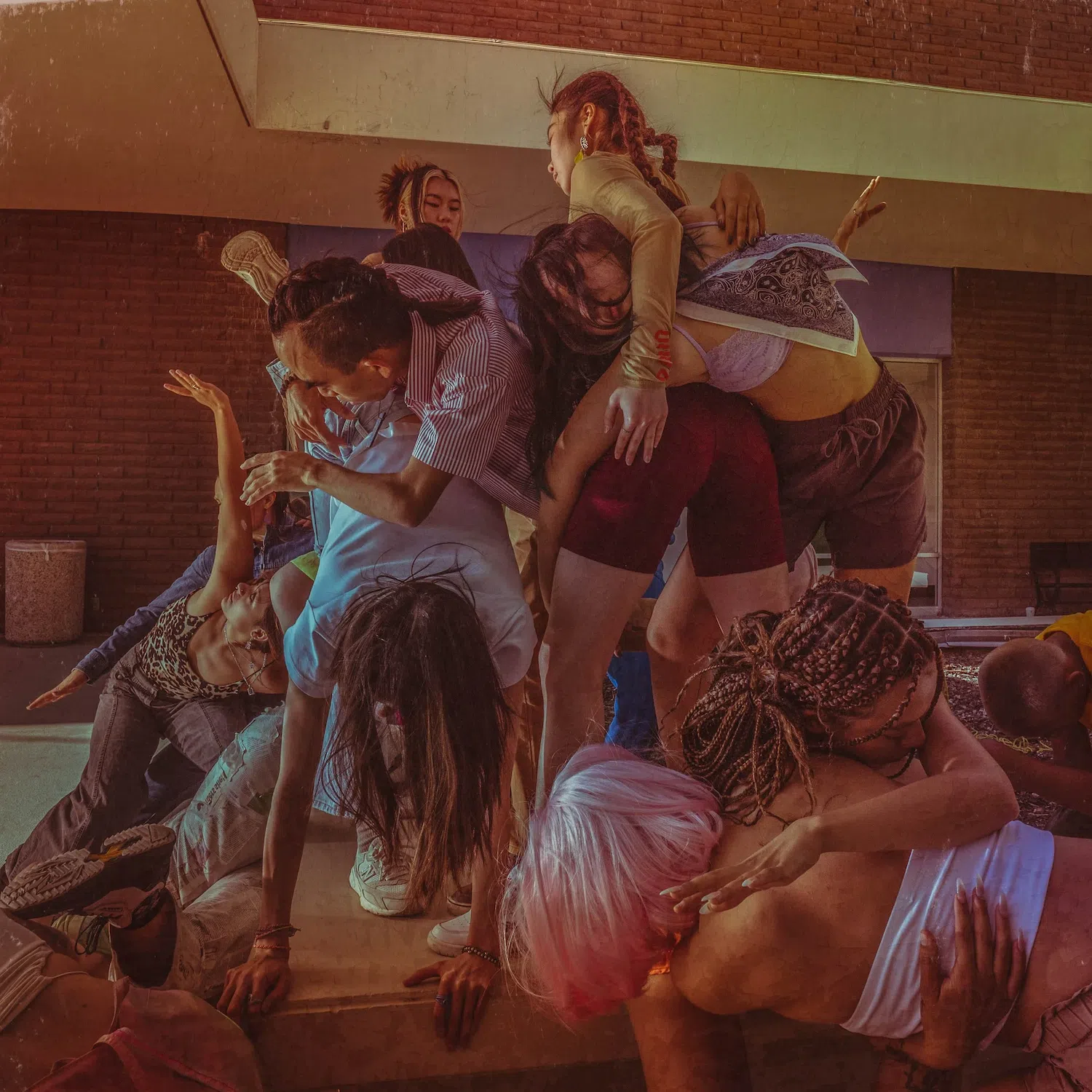 Dance photograph captured by Josh S. Rose, featuring a group of dancers in colorful clothing