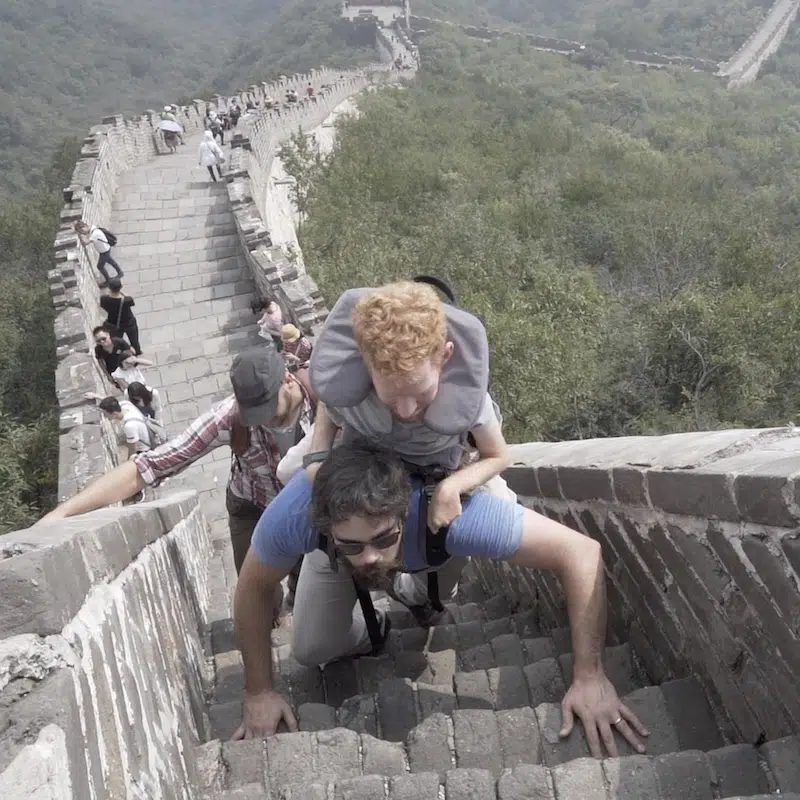 Kevan Chandler in Backpack with Friends at Great Wall
