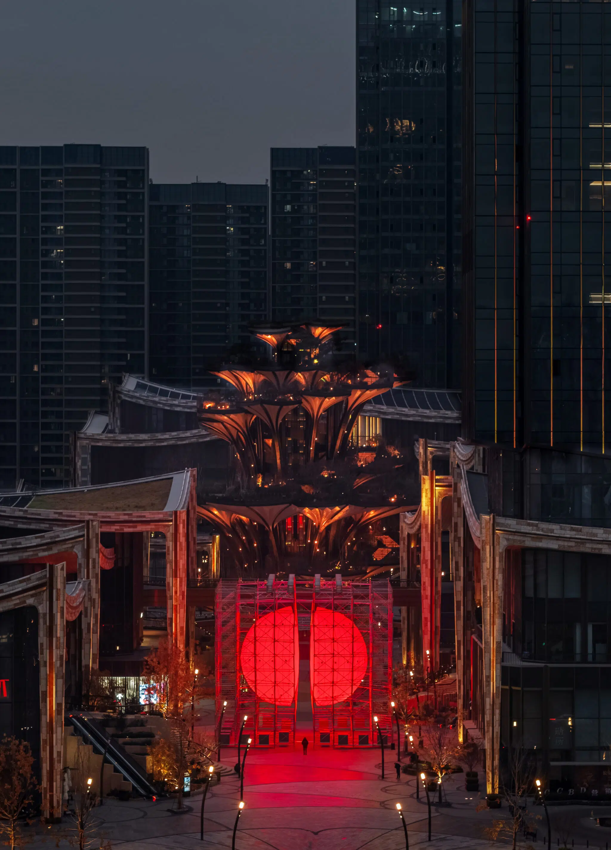 Installation view of SpY&rsquo;s &lsquo;Divided&rsquo; installation in Xi'an, China, composed of a monumental, illuminated red sphere