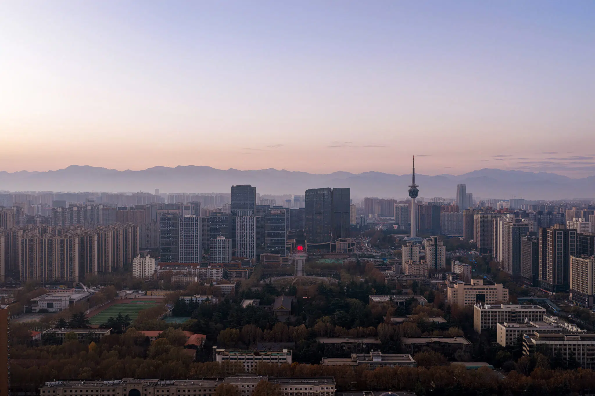Installation view of SpY&rsquo;s &lsquo;Divided&rsquo; installation in Xi'an, China, composed of a monumental, illuminated red sphere