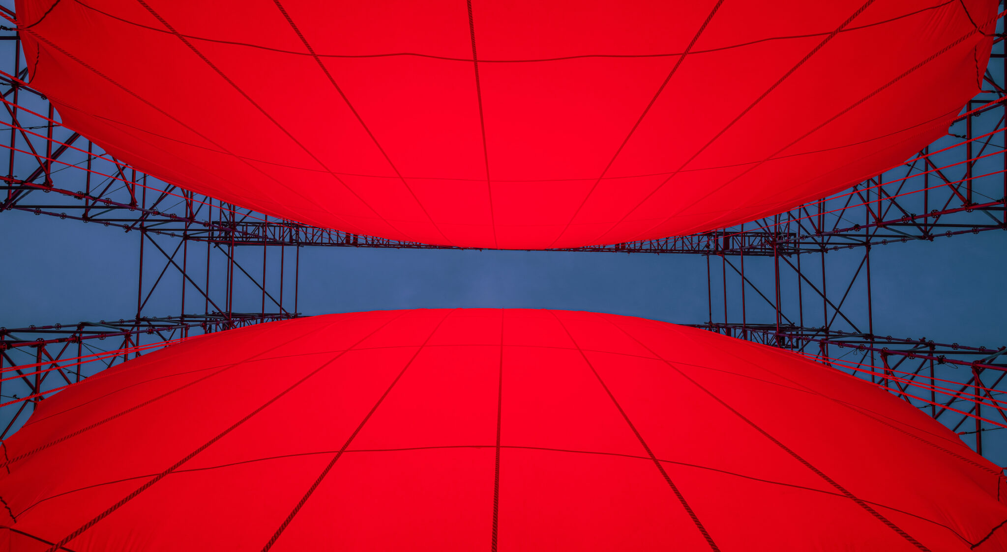 Installation view of SpY&rsquo;s &lsquo;Divided&rsquo; installation in Xi'an, China, composed of a monumental, illuminated red sphere