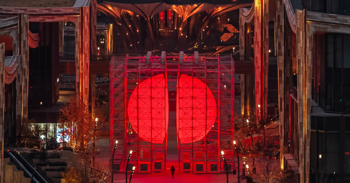 Giant Luminous Sphere Split in Half Dramatically Pops Up at a Vertical Park in China