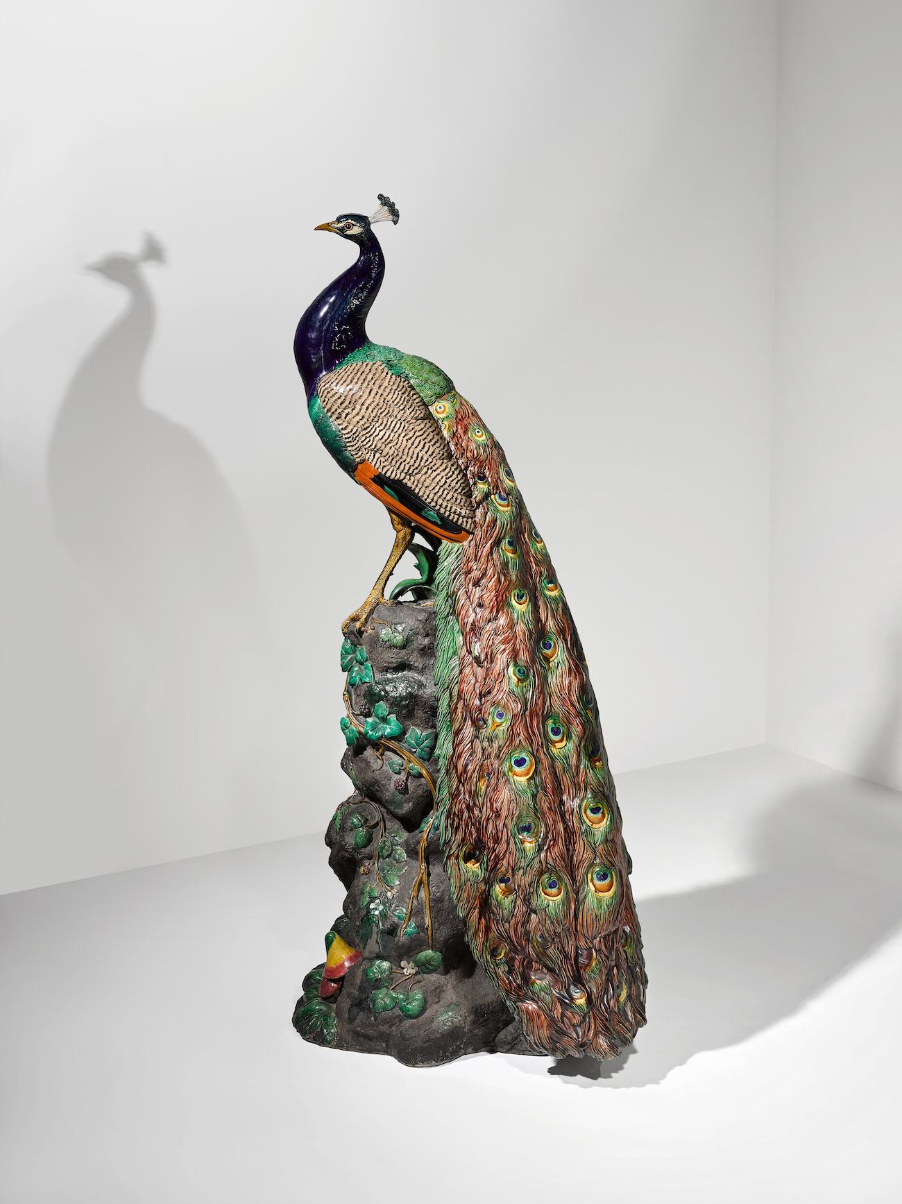 A life-size Minton & Co. majolica figure of a peacock, 1876. (Courtesy French & Company)