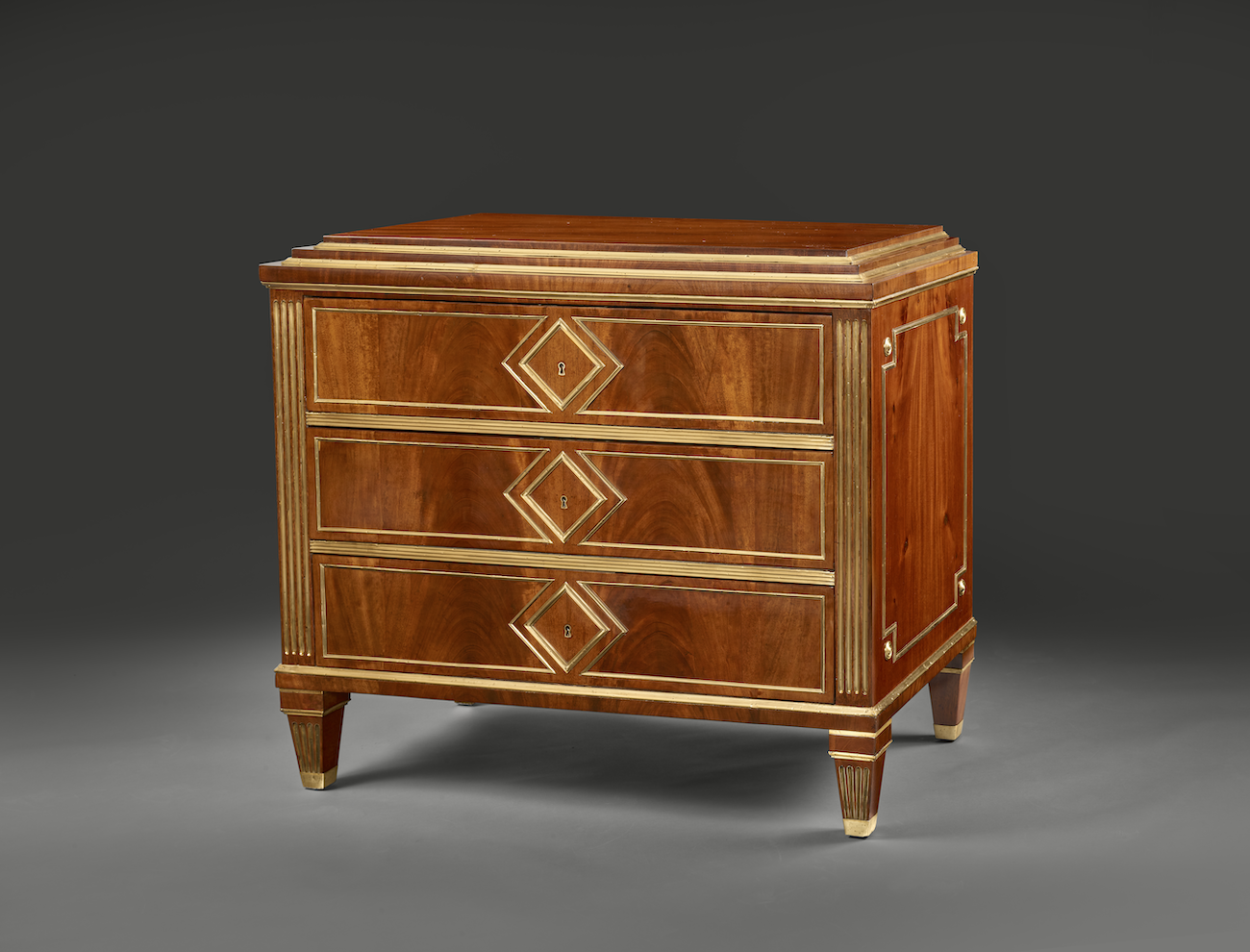 Pair of mahogany chests of drawers, Russian, early 19th century. (Courtesy Galerie L&eacute;age)