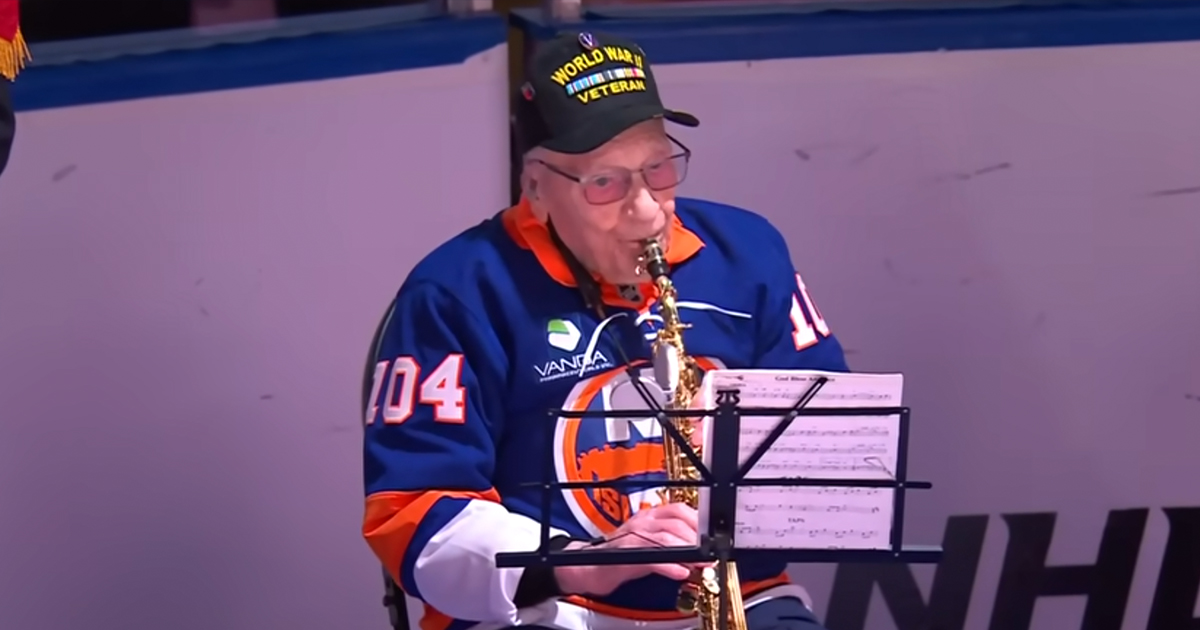 104-Year-Old World War II Veteran Performs Moving Saxophone Anthem at Hockey Game