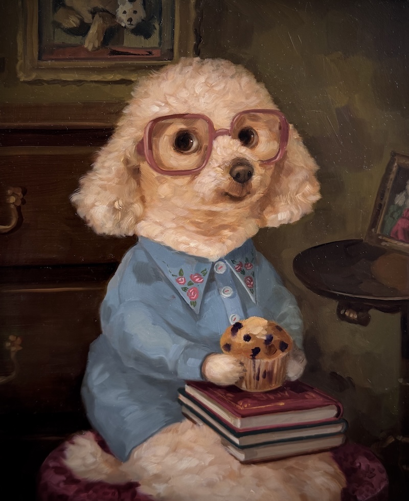 dog holding a cookie