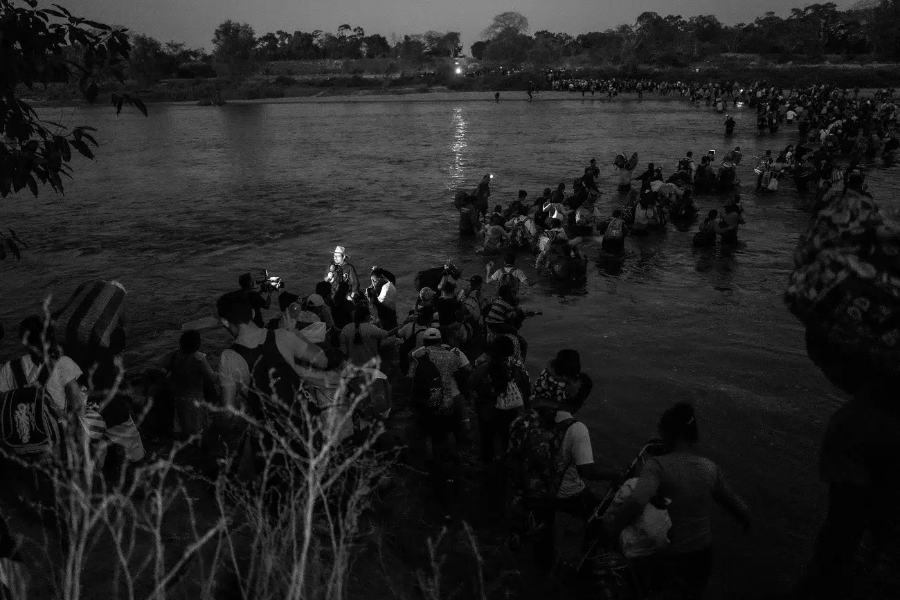 Ada Trillo "Crossing the Suchiate River," 2020 from the series "La Caravana del Diablo," Guatemala/Mexico border Archival pigment print, 24 x 30 in.