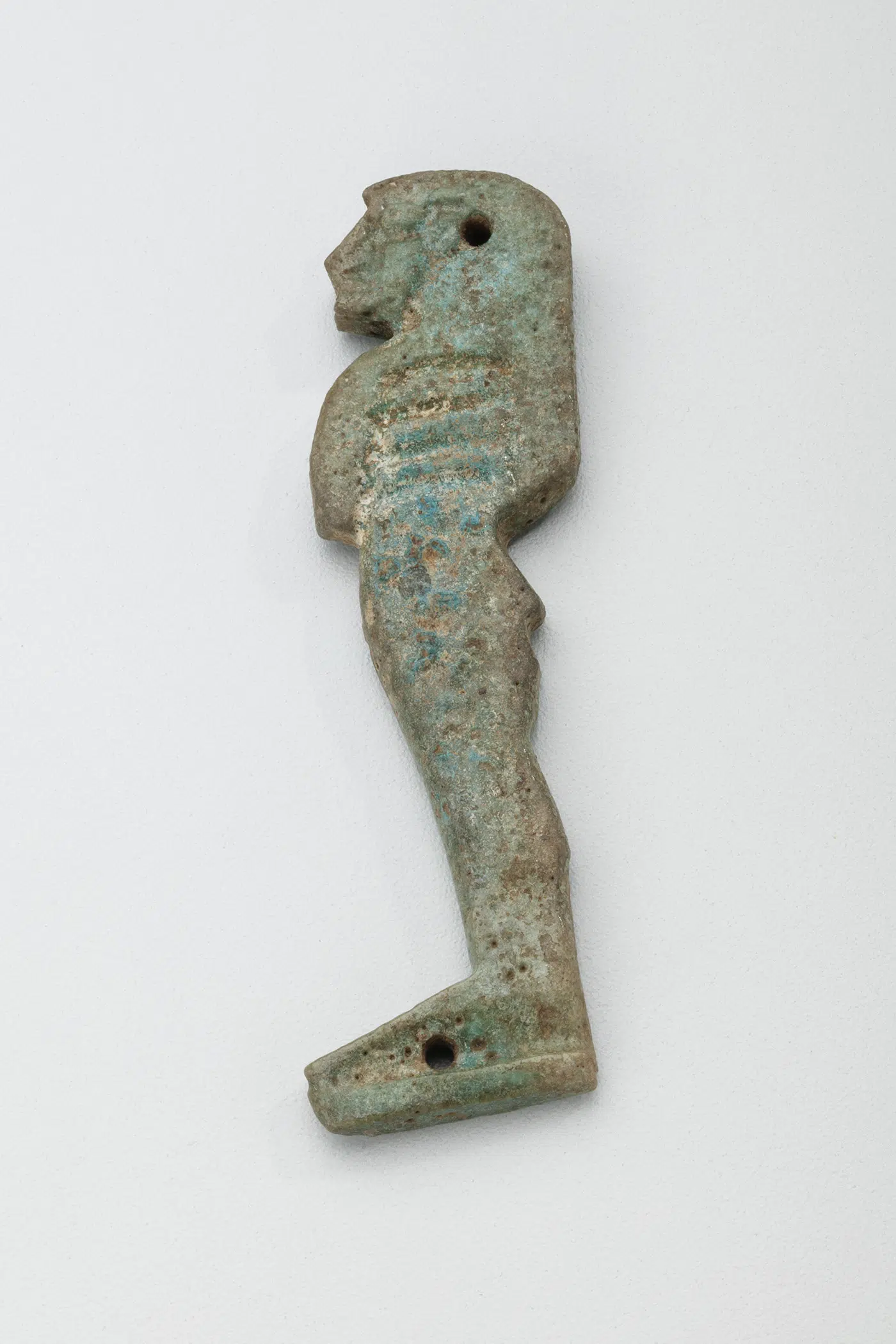 One of four amulets in a set depicting the sons of Horus. Egyptian, 23rd-25th Dynasties, 818-664 BCE. Faience.