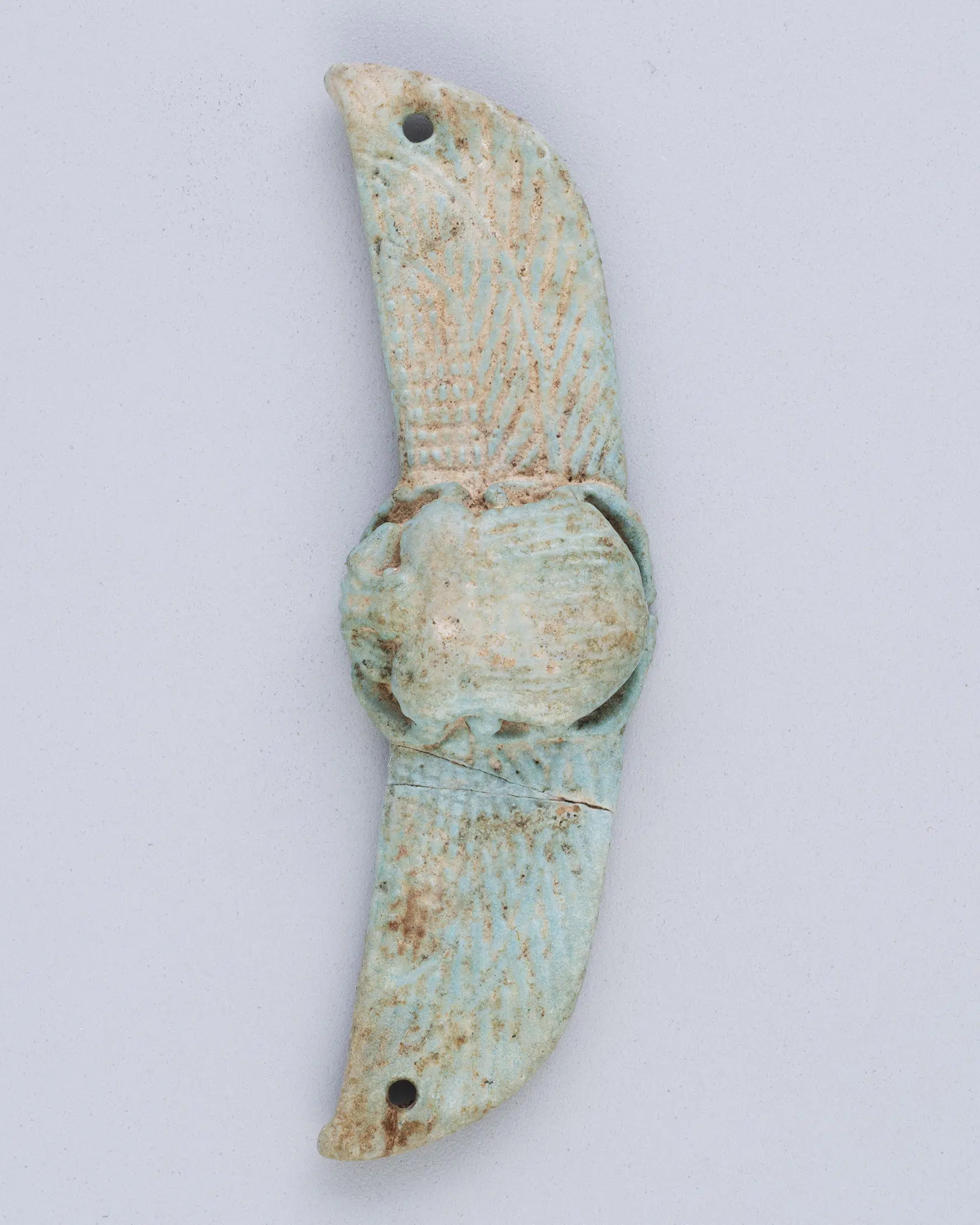 Winged scarab amulet. Egyptian, 25th-31st Dynasties, 747-332 BCE. Faience.
