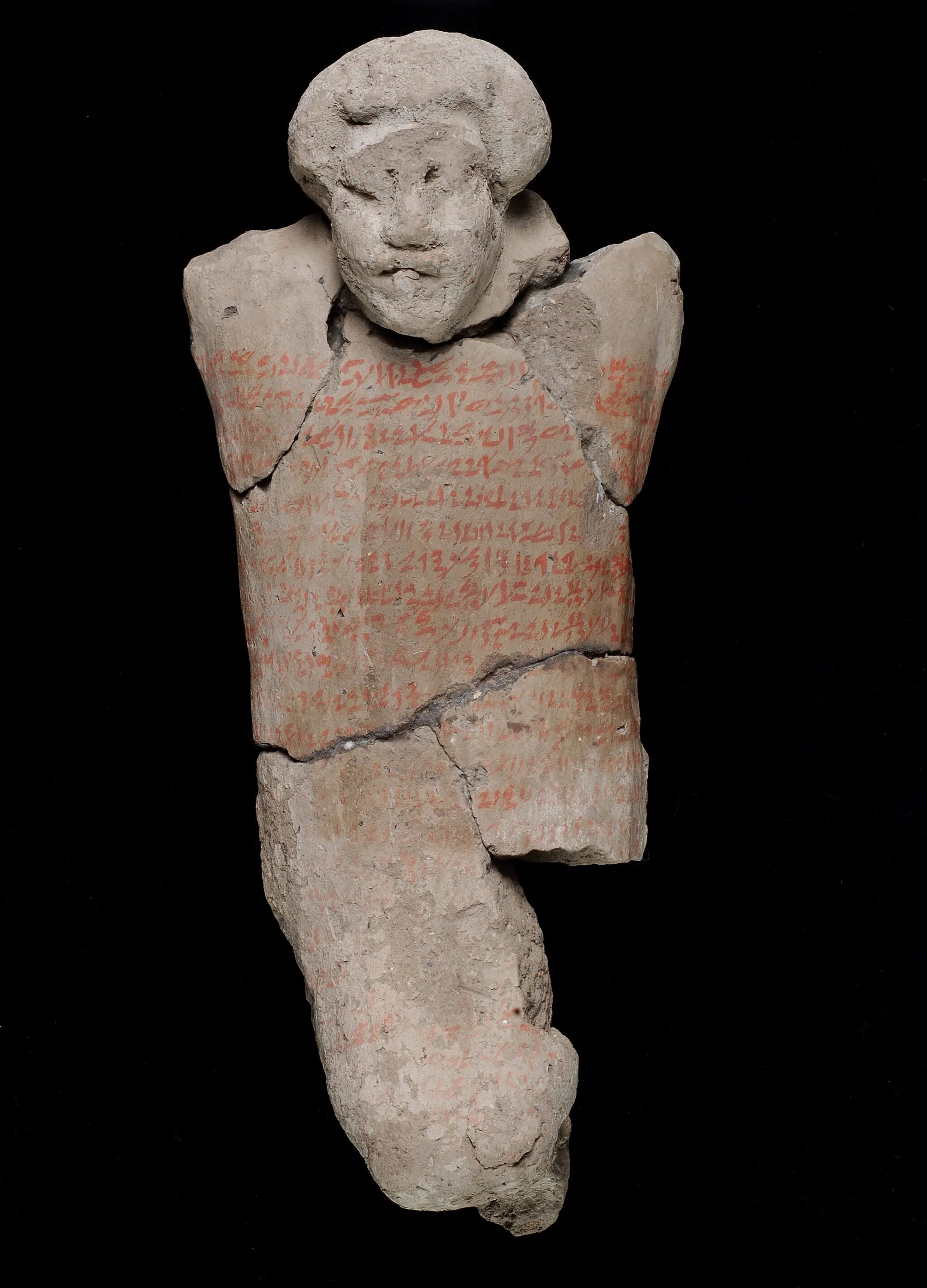 Curse figure. Egyptian, Middle Kingdom, 12th Dynasty, 1991-1802 BCE. Clay with red pigment.