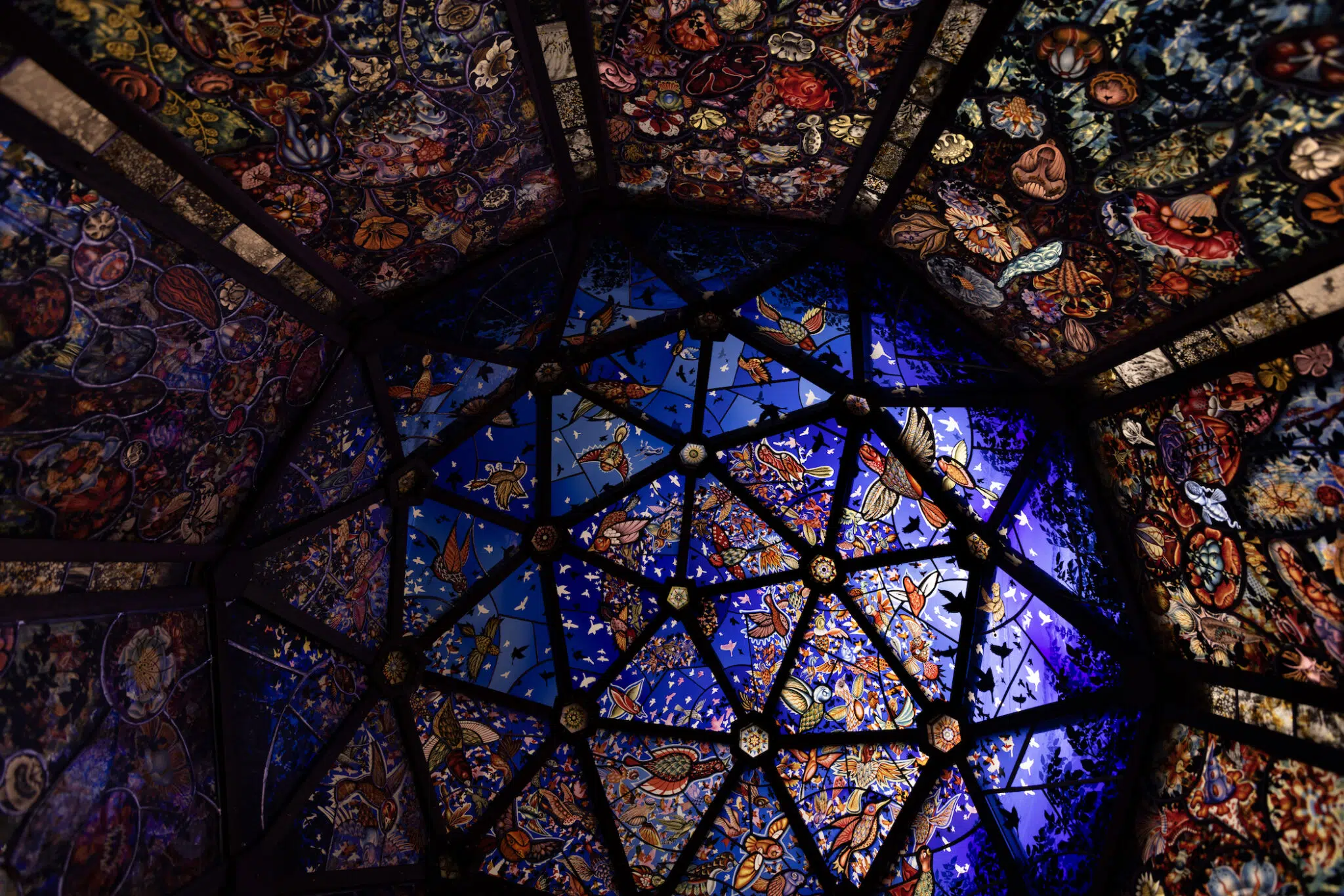 &ldquo;Super/Natural,&rdquo; 2025, stained glass panels and steel and wooden frame.