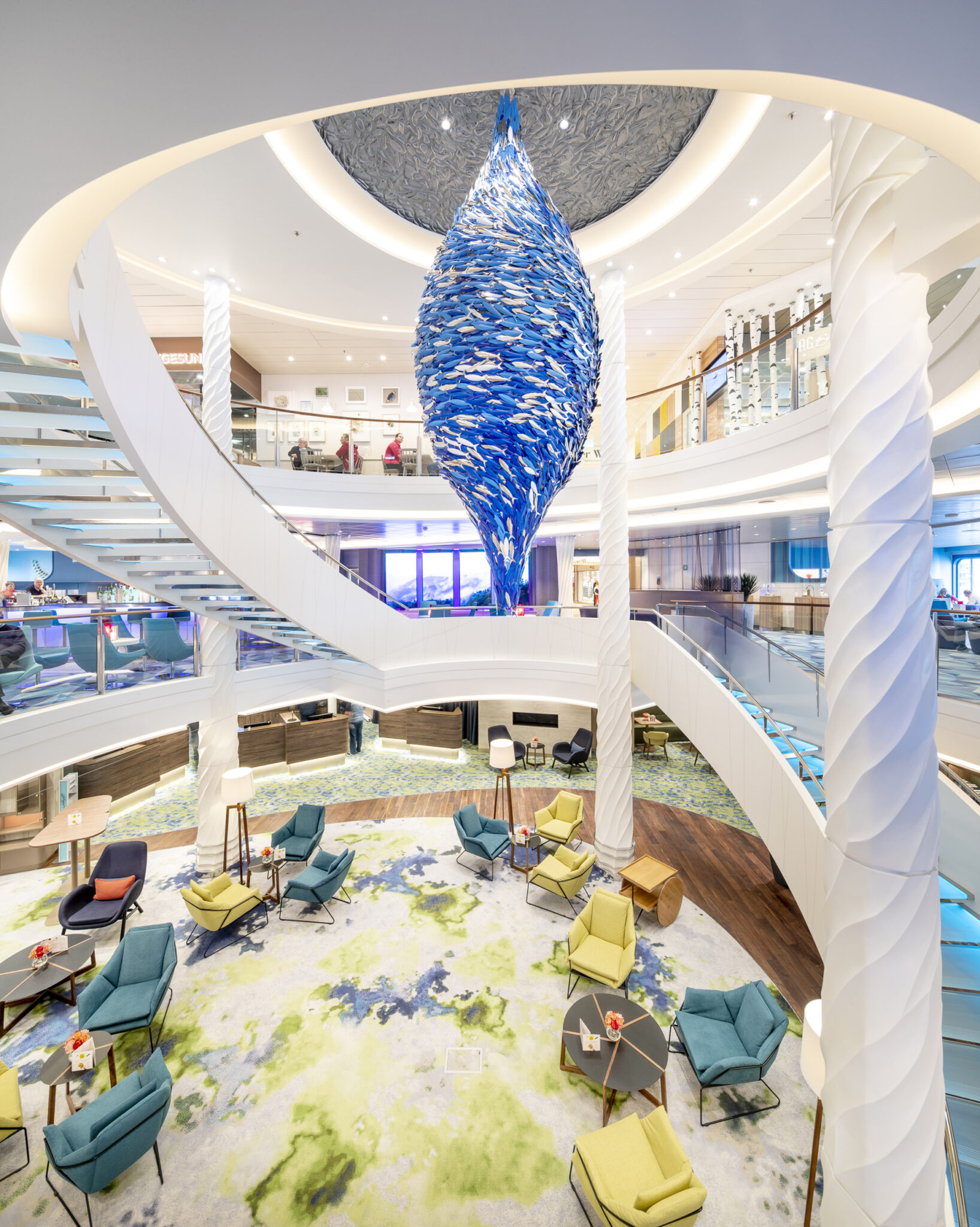 A Scabetti chandelier composed of glass fish hanging from the ceiling