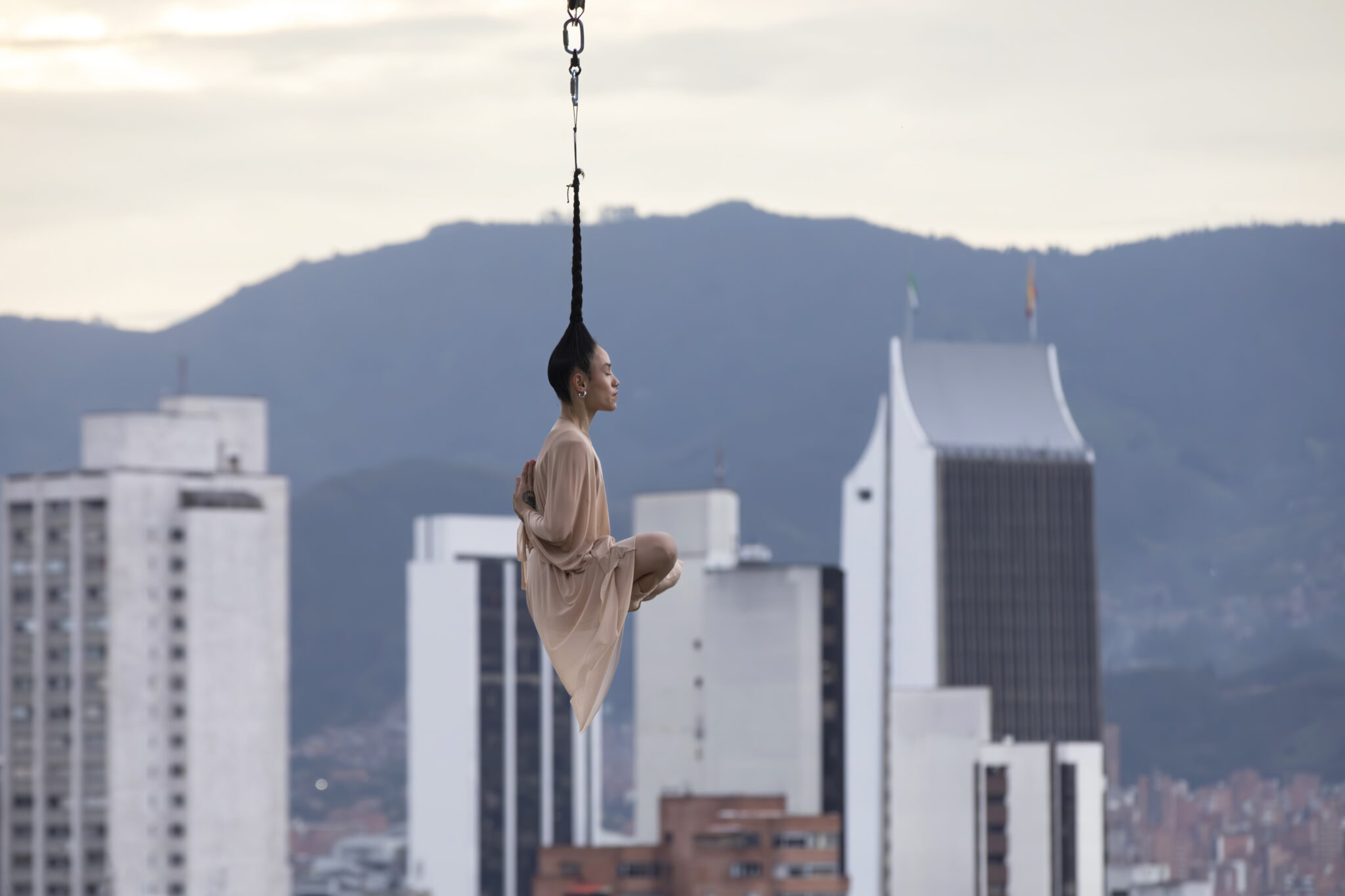 Roxana&rsquo;s parents and grandparents were born outside the city of Medell&iacute;n, Colombia, but were forced to move there by the guerrilla violence that was experienced in the countryside. At a very young age, Roxana learned the sporting art of hanging by her hair, which helped her survive living on the streets.