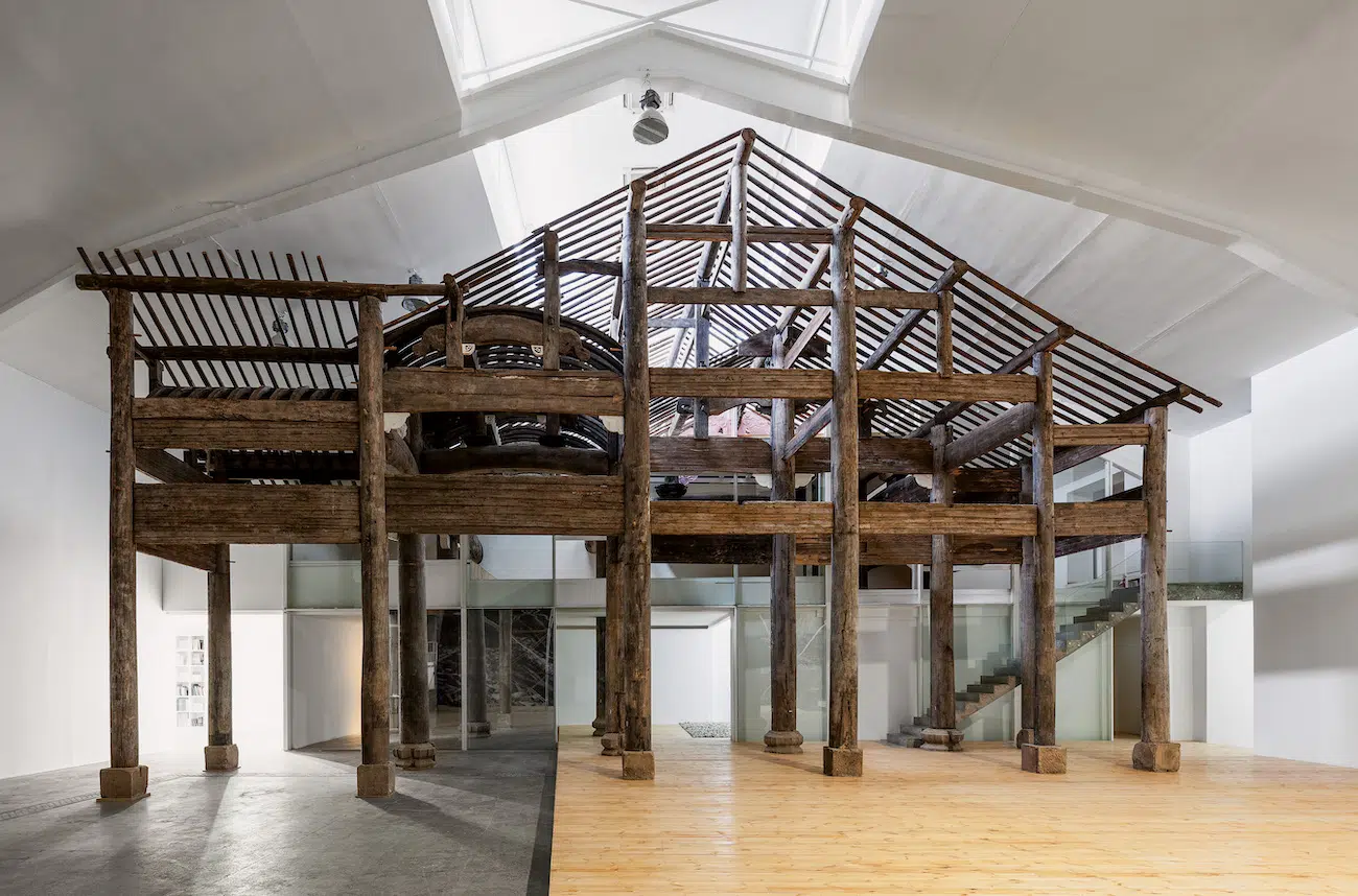 Installation view of &ldquo;Wang Family Ancestral Hall,&rdquo; 2015, at Tang Contemporary Art in Beijing. Over 1,300 pieces of various wooden building elements from the late Ming Dynasty with original carvings and painted replacements.