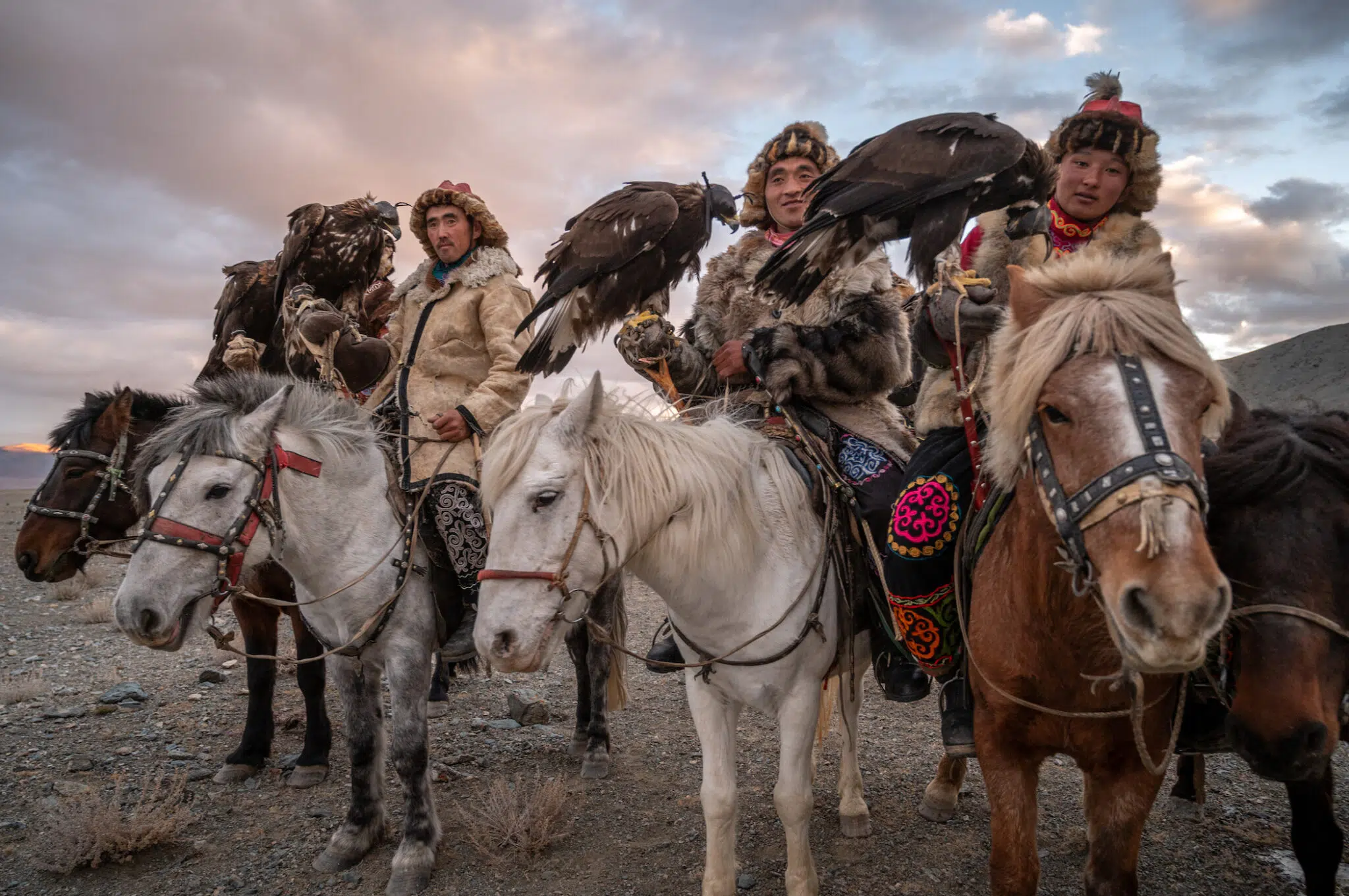 High in the Altai Mountains, a group of Kazakh horsemen gather with their golden eagles, carrying forward a centuries-old tradition of eagle hunting.
