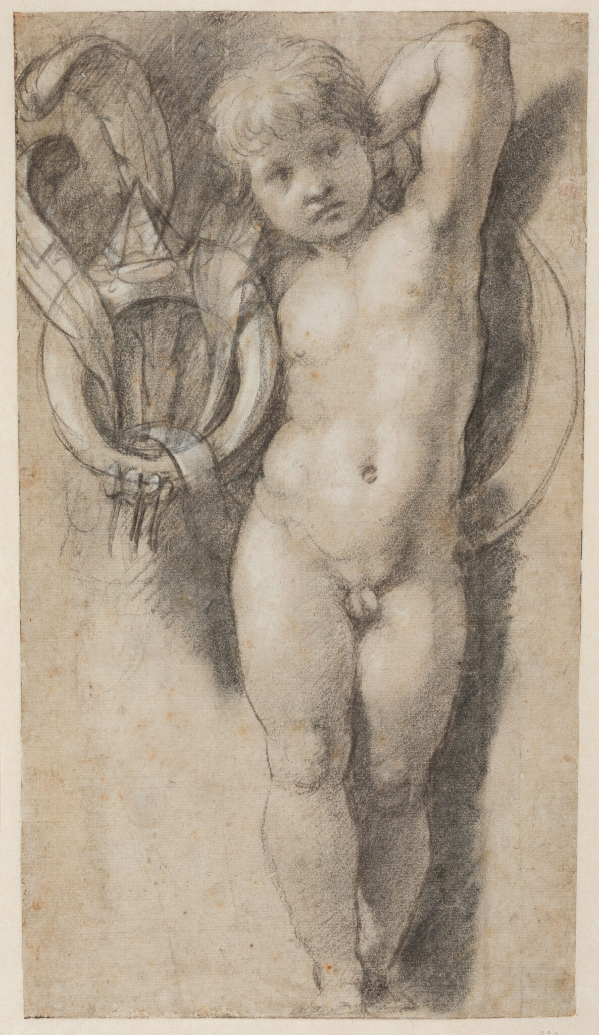“Study of Putto with the Impresa of Pope Leo X de’ Medicica,” 1513-14. Black chalk, heightened with white chalk, with later framing lines in black. (Photo: Teylers Museum, Haarlem)