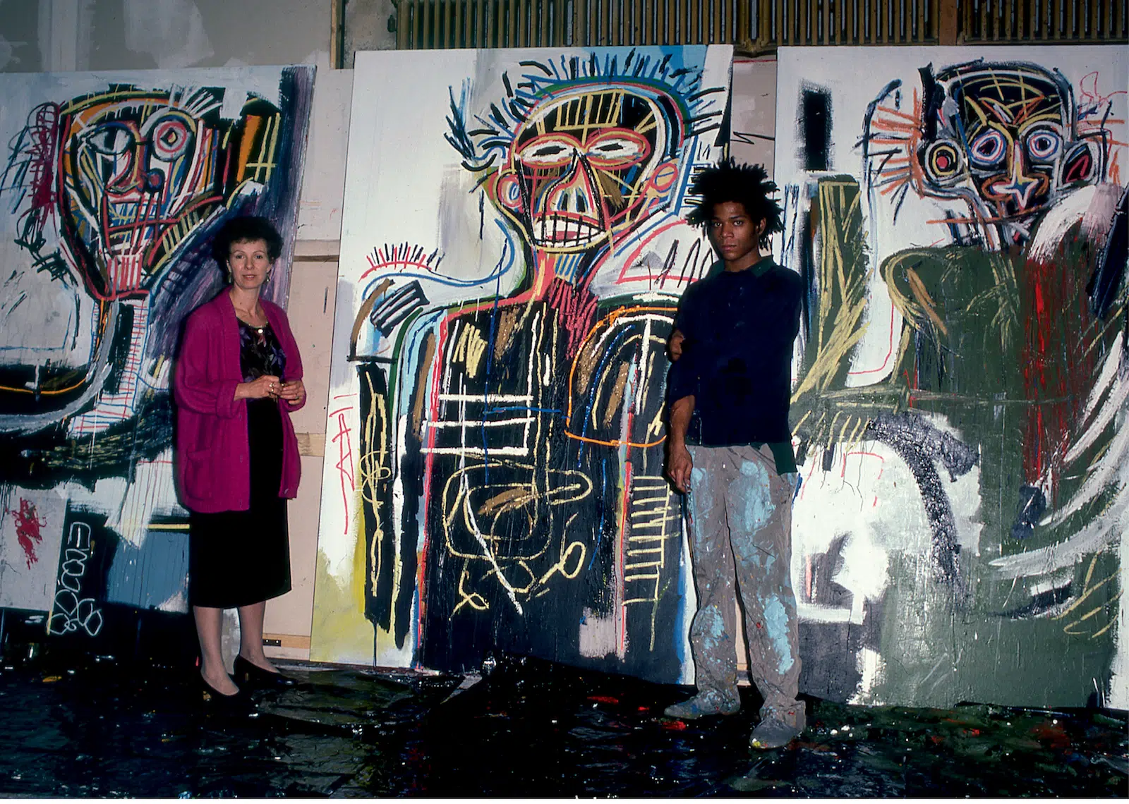Gallerist Annina Nosei and Basquiat in his studio in the basement of Annina Nosei Gallery on Prince St., SoHo, 1982. (Photo: Naoki Okamoto)