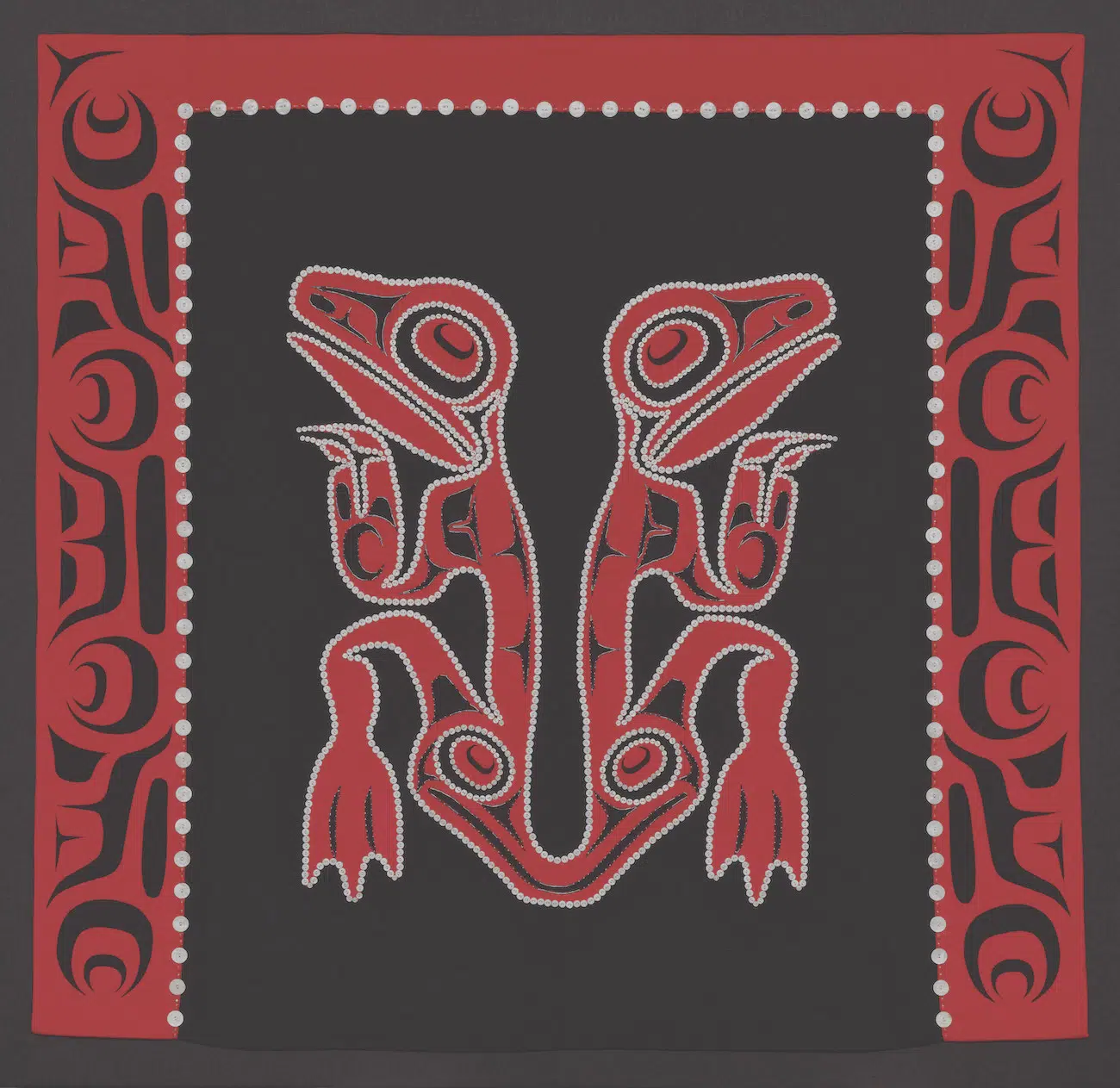 Dorothy Grant (Kaigani Haida, b. 1955) (Maker)Robert Davidson (Haida, b. 1946) (Designer) Robe, 1992 Cashmere wool; fulled, appliqu&eacute;, reverse appliqu&eacute;, applied mother-of-pearl buttons, and glass beads, 56 1/2 x 58 13/16 x 5/16 in. (143.51 x 149.4 x 0.8 cm) Fine Arts Museums of San Francisco, Gift of Melinda Balaam and Emi Stanley, 1992.