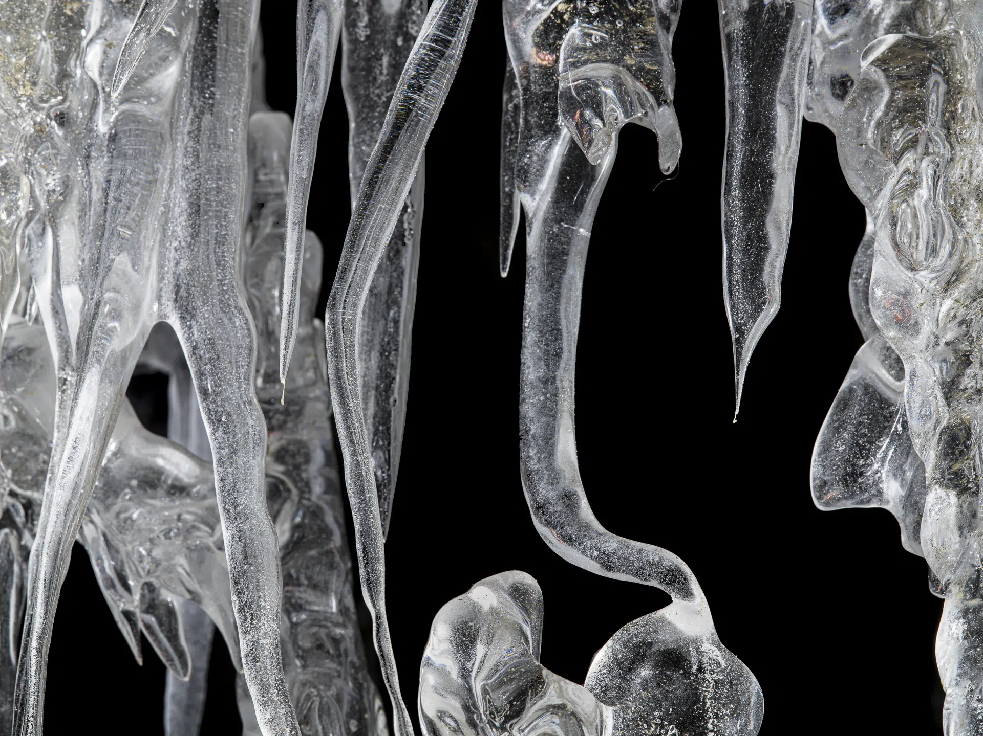 Svalbard, 2023. Deep beneath a glacier in Svalbard, photographing a delicate ice structure felt like entering a hidden cathedral carved by time and pressure. The air was still and intensely cold, and every sound seemed absorbed by the ice itself.