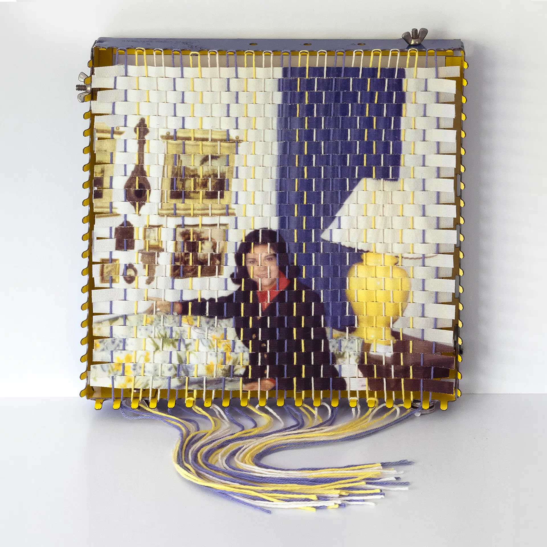 A family photograph that has been torn apart and resewn using a vintage pot holder loom, created by Pam Connolly for her &ldquo;Columbus Drive&rdquo; series